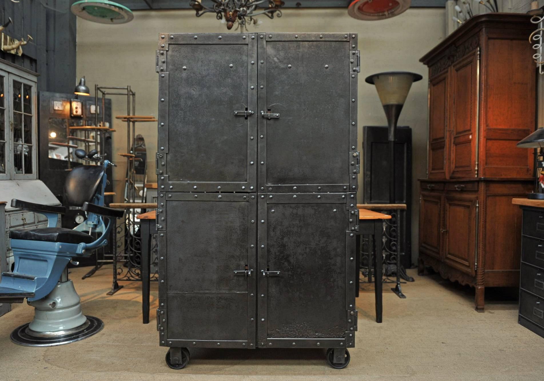 Exceptional Four-Doors Industrial Riveted Iron Cabinet on Wheels, circa 1900 1