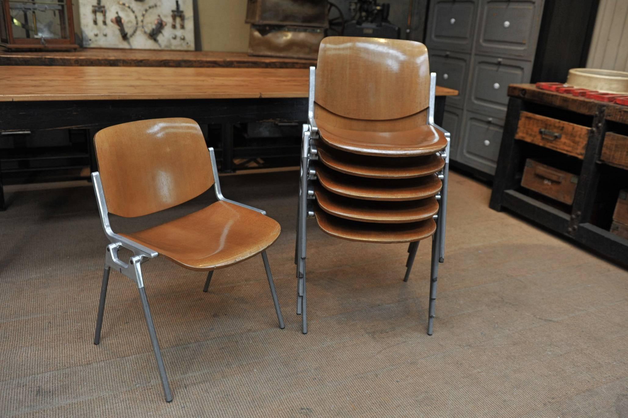 Set of Six Italian design chairs by Giancarlo Piretti for Castelli, plywood and aluminium, circa 1960 Made in Italy. Castelli carved twice on each chairs (see pictures). Price for set of six.
   
