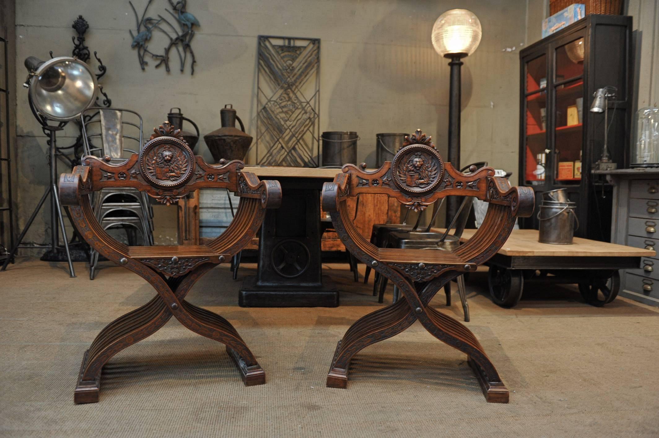 Exceptional quality pair of Dagobert solid carved solid walnut armchairs with folding system, circa 1850.
 