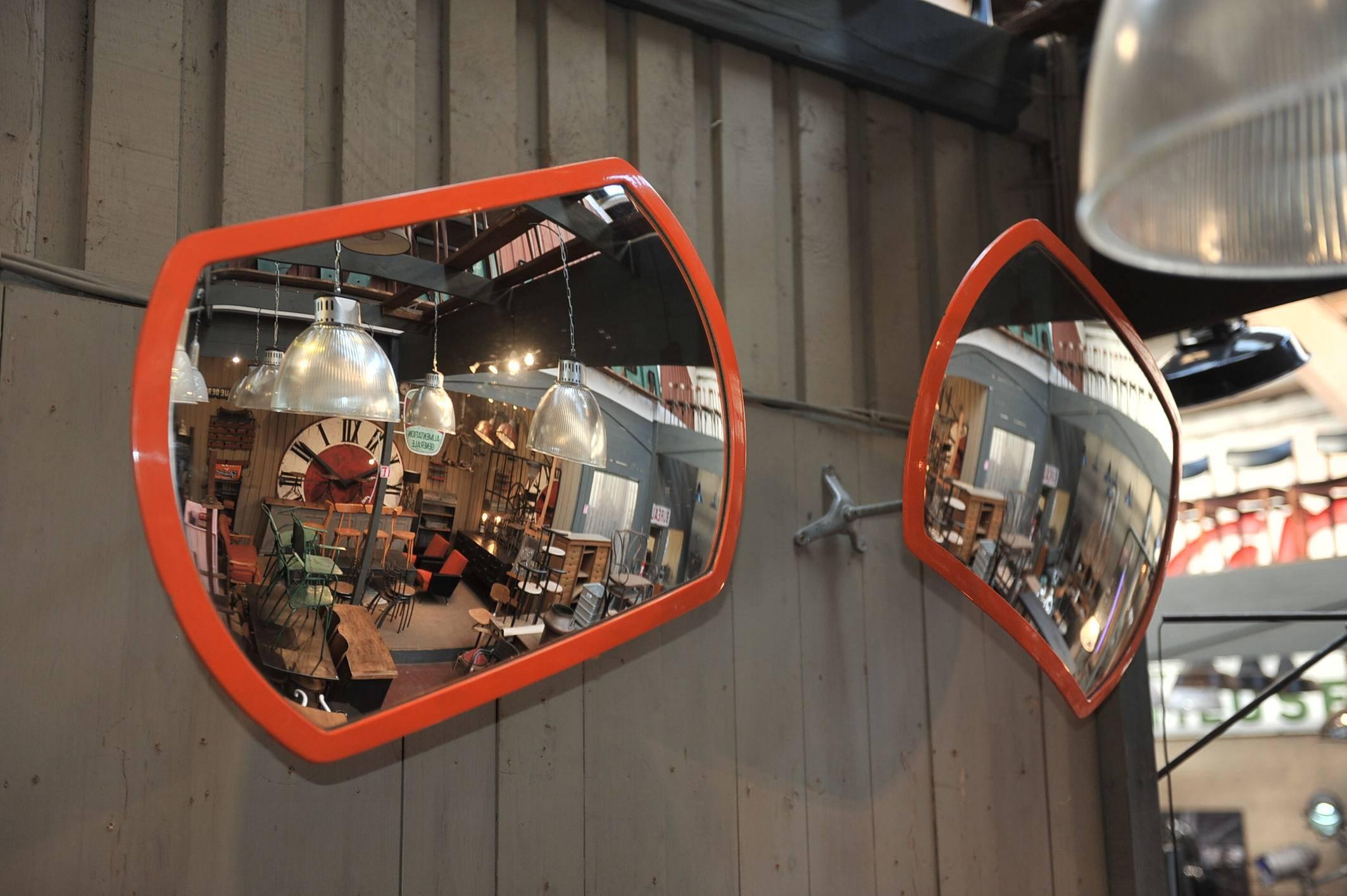 Paire of 1960 s orange Fibreglass Convex Mirrors with metal adjustable and removable  wall arm.
 Depht without Arm: 6 cm