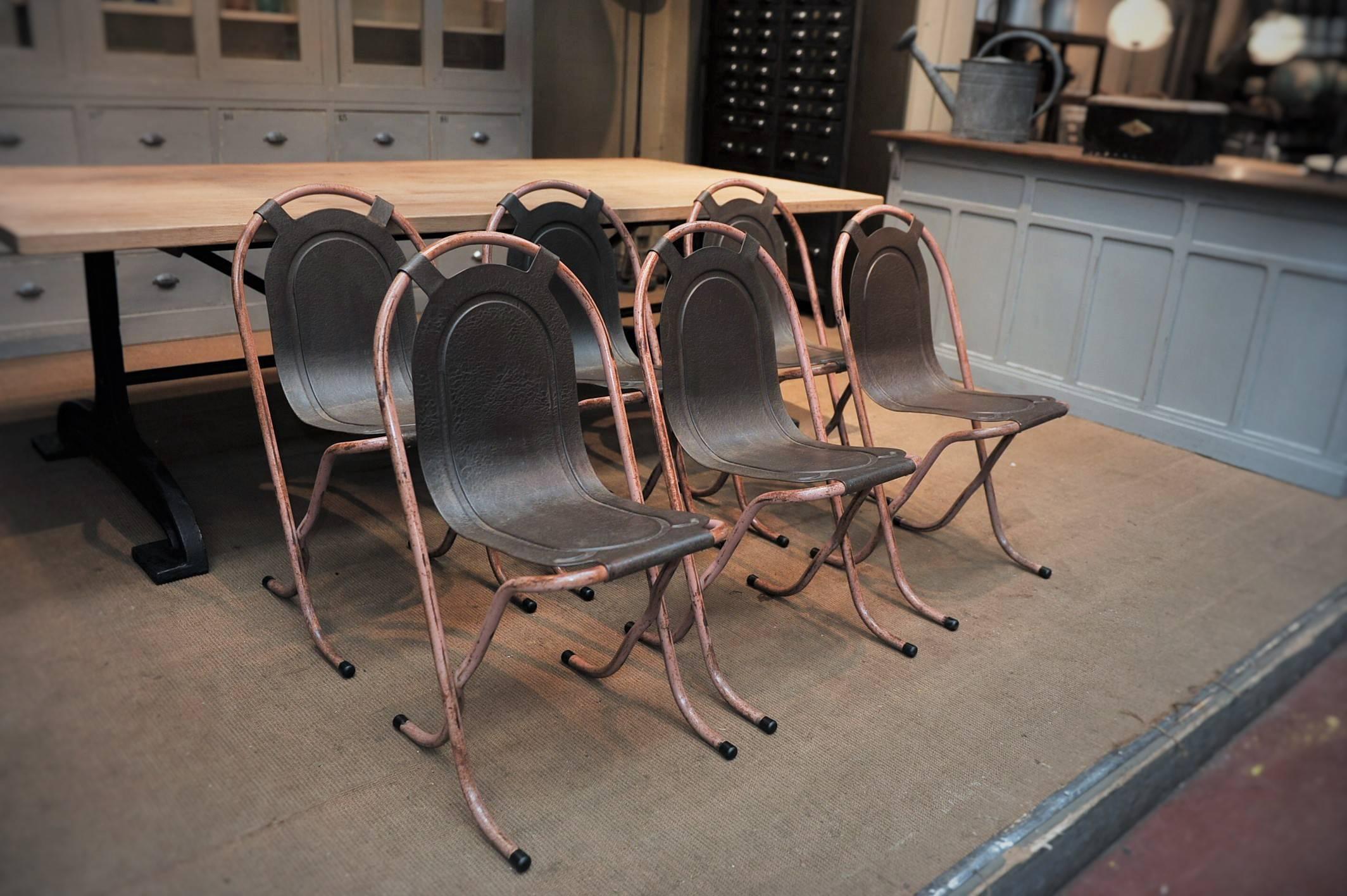 Set of six rare French stackable iron Industrial chairs; All original patina cleaned and waxed. Very stable.