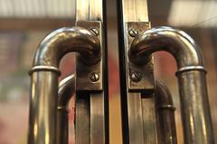 Pair of 1900 Banque de France Oak and Bronze Swing Doors 1900s