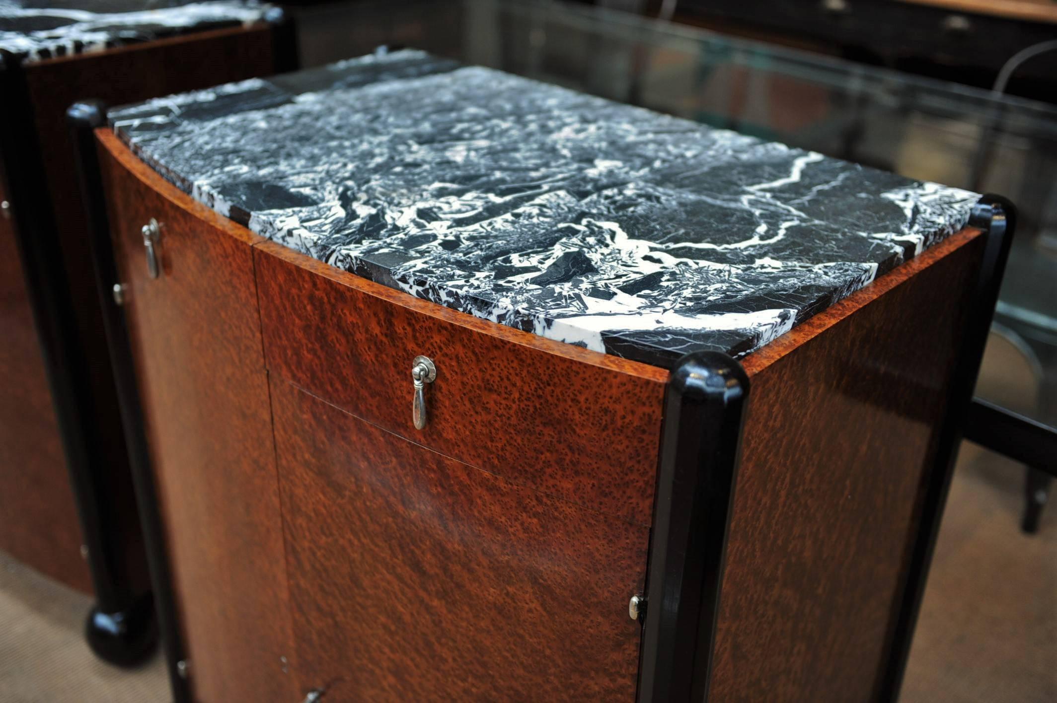 Pair of French Art Deco curved doors and drawers little sideboard cabinets with beautiful burl wood venneered on mahogany and original marble top. Adjustable shelves inside, circa 1925.