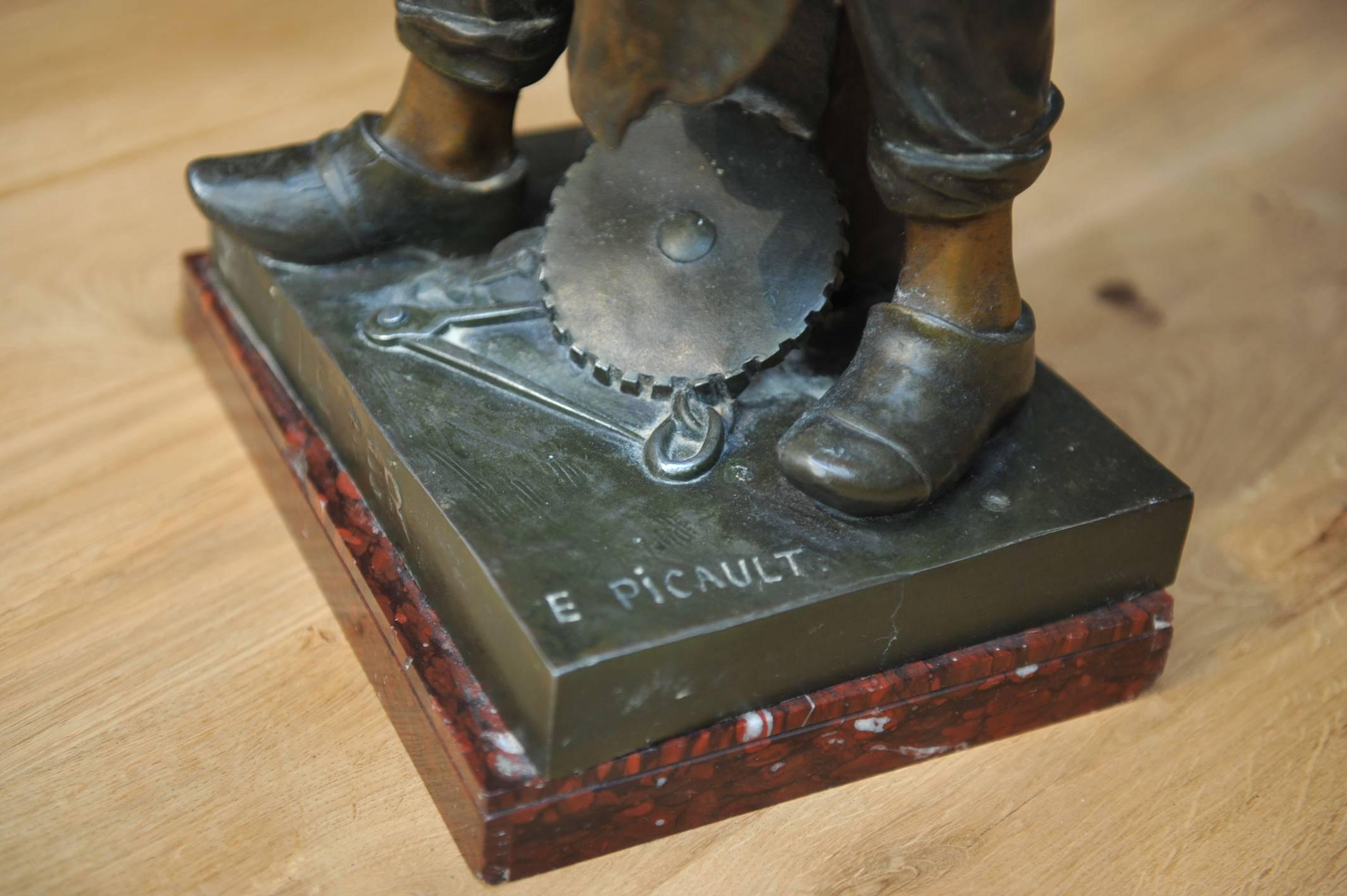 Late 19th century Regule metal blacksmith statue called "Le FER" (Iron) by and signed Emile Louis Picault (Born in Paris 1833-1915). Very nice bronze patina. Original marble base. Excellent condition.
 