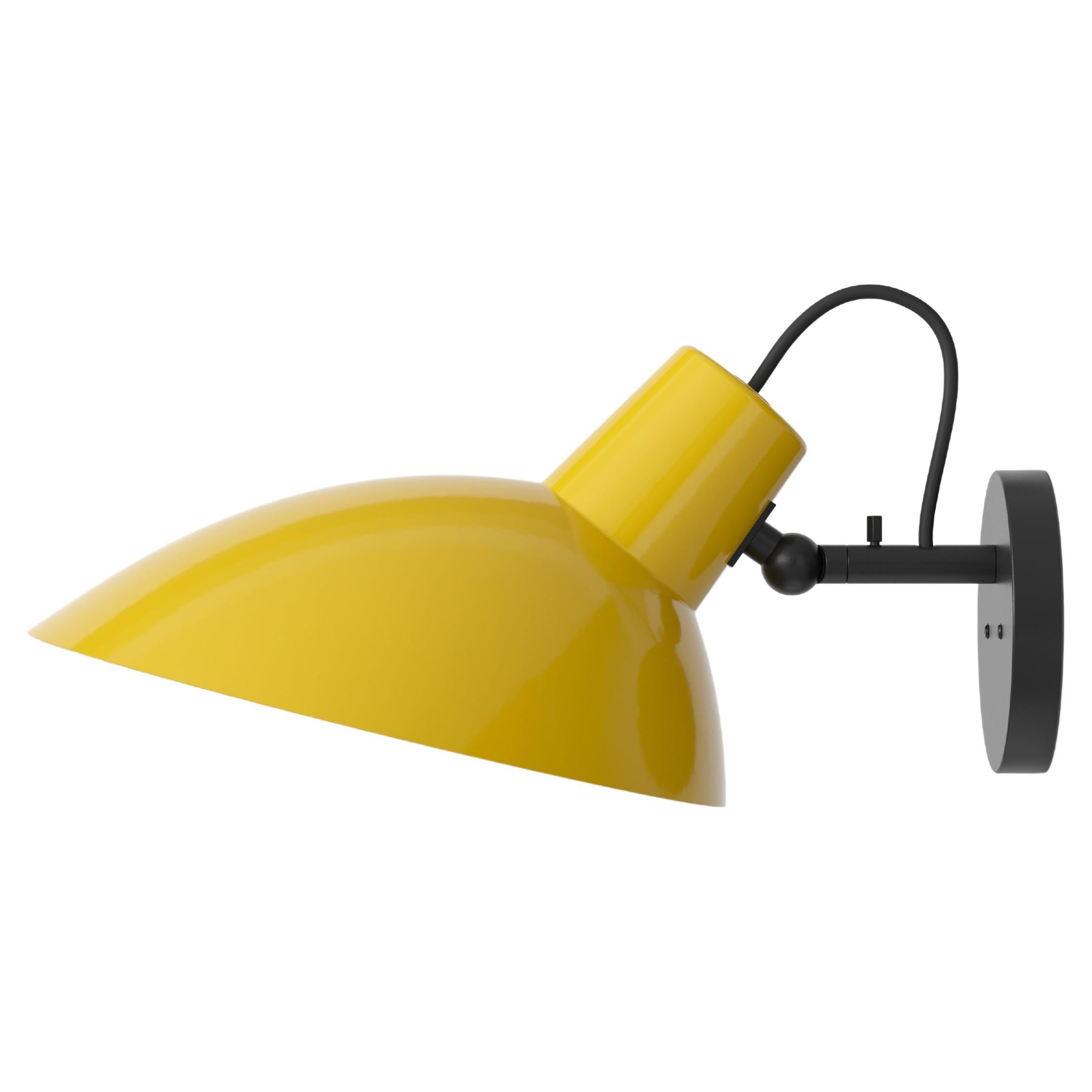 Pair of Vittoriano Viganò 'VV Cinquanta' sconces in yellow and black for Astep. Viganò was the art director of Arteluce, the company founded by his creative partner Gino Sarfatti, and the visor was one of his most celebrated designs. This is an