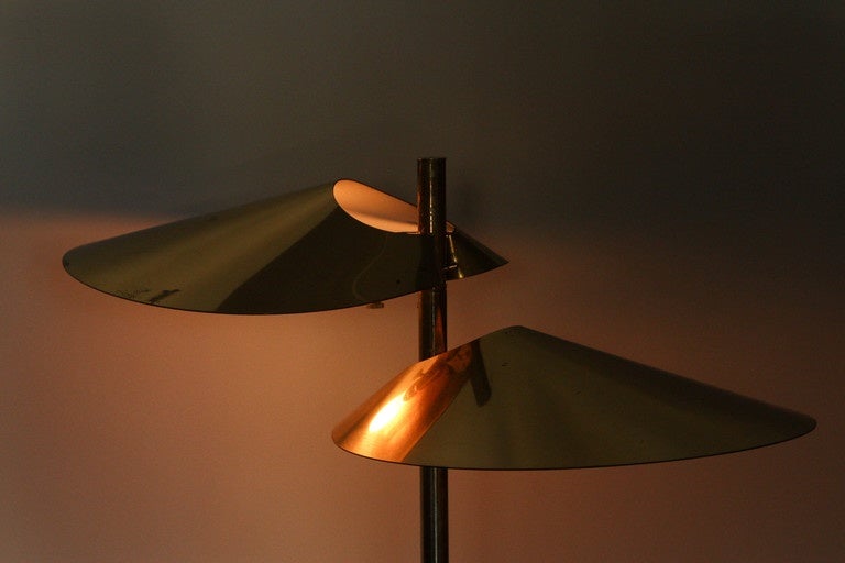 1970s Curtis Jere 'Lily Pad' floor lamp. An elegant and simple design executed in brass, USA, circa 1977.