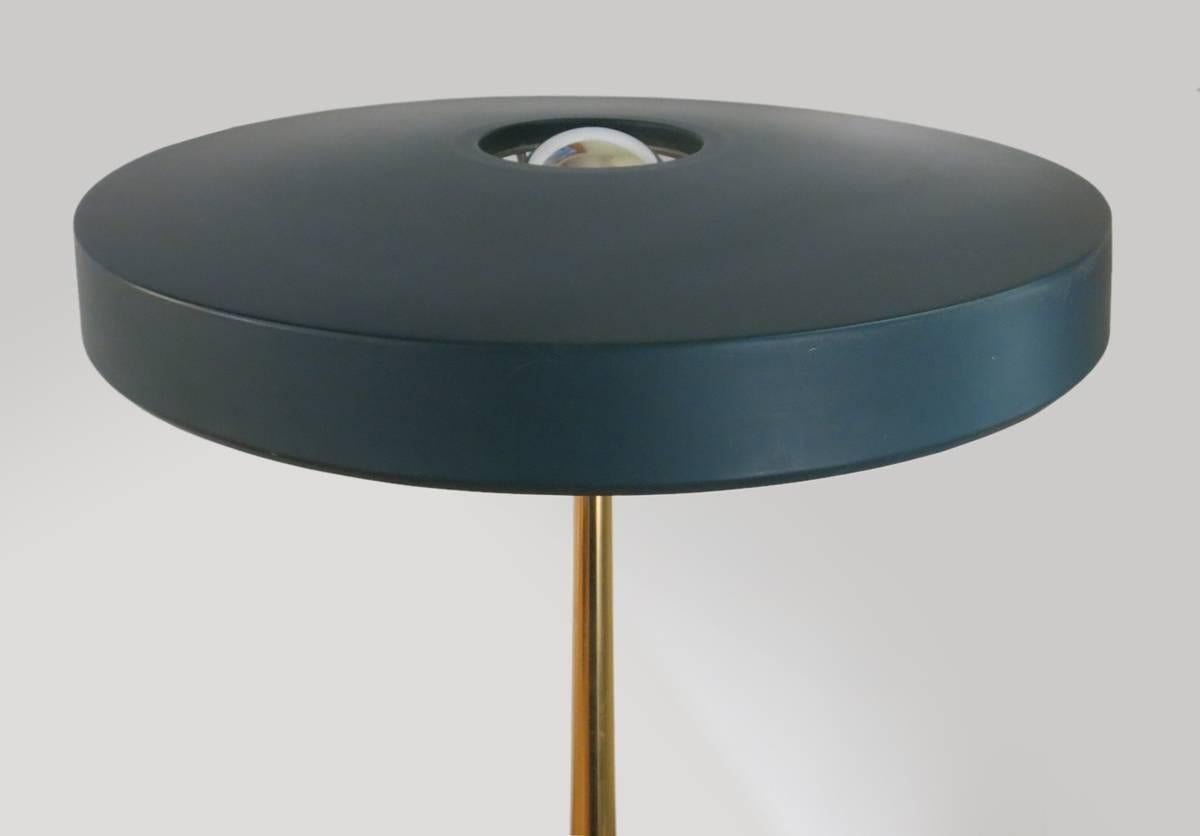Dark green enameled metal shade and base with patinated brass stem for Philips, The Netherlands, circa 1950s.