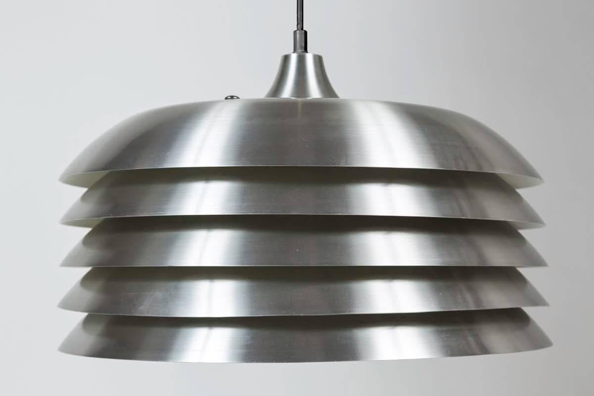 1960s Hans-Agne Jakobsson Chandeliers for Markaryd. Executed in brushed aluminum. 

Price per item.