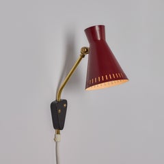 1950s Perforated Red Diabolo Plug-In Wall Lamp Attributed to Mauri Almari