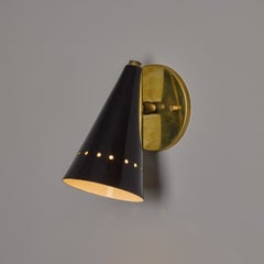 Stilnovo Petite Black Perforated Sconce with Brass Arm, Midcentury 1950