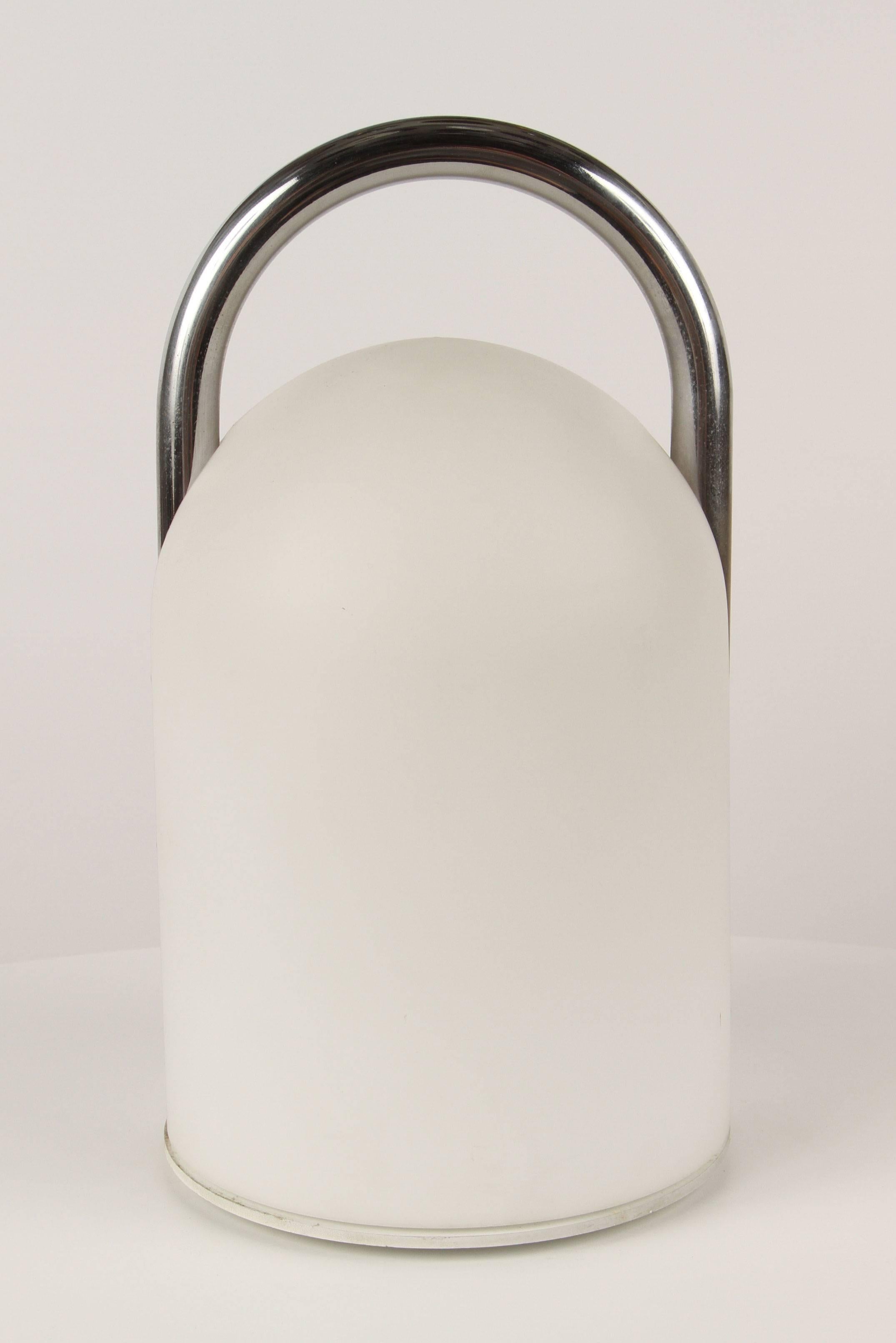 Romolo Lanciani 'Tender' table lamp for Tronconi. Executed in opaline glass and chrome, Italy, circa 1980s.

Tronconi was a major Italian lighting and design company founded by Enrico Tronconi. Previously Tronconi had designed the iconic 'Bamboo'