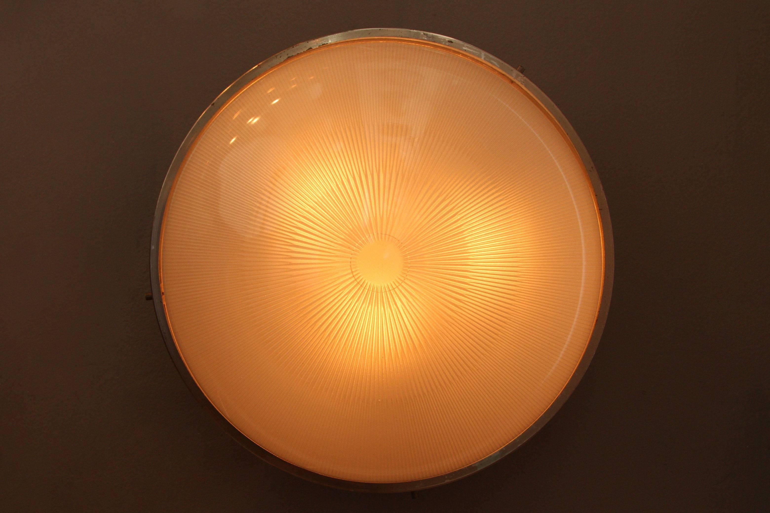 An extra large sized 'Sigma' wall or ceiling light executed in nickeled brass and pressed opaline glass by Sergio Mazza for Artemide, Italy, circa 1960s.

Price is per item. 2 lights available.