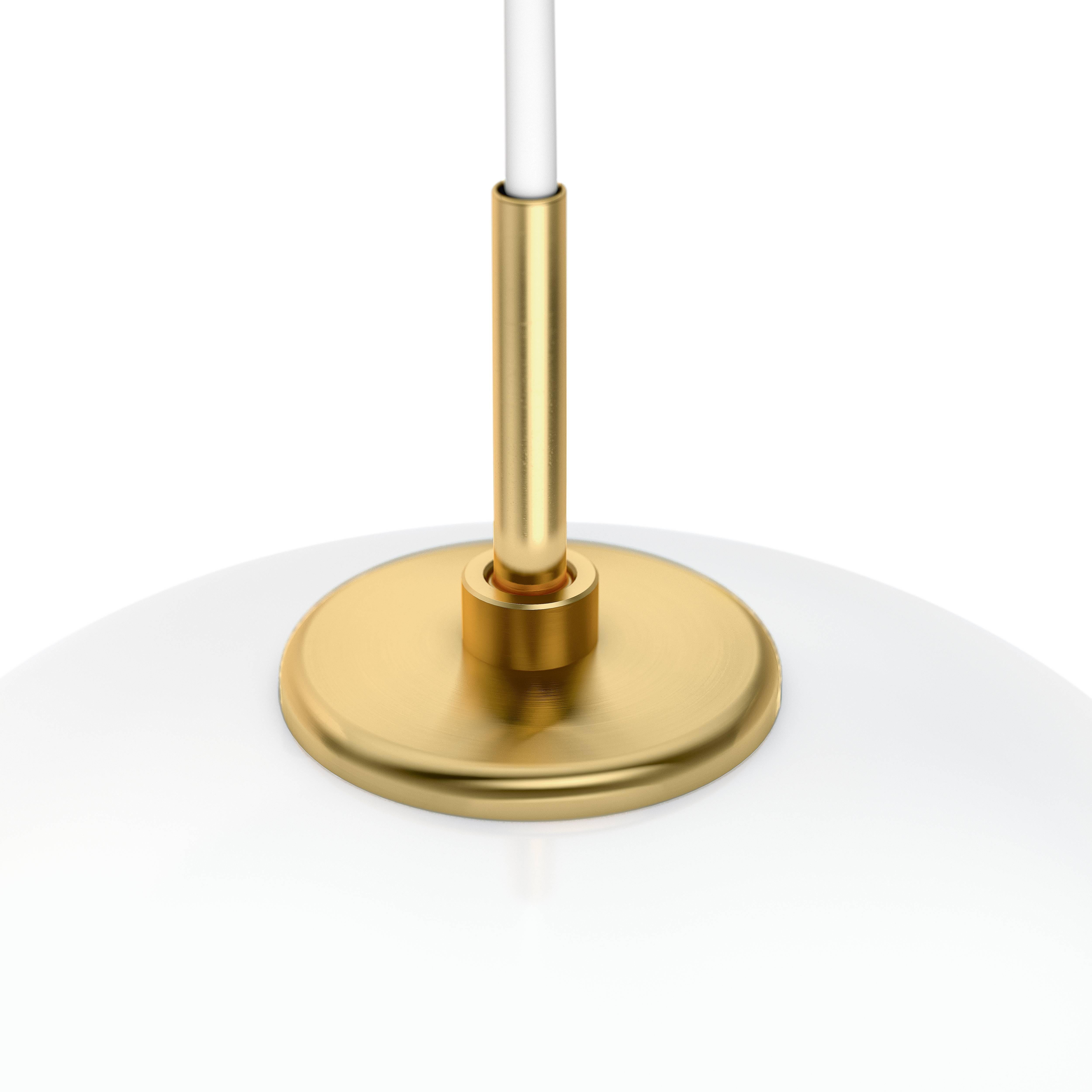 Vilhelm Lauritzen VL45 'Radiohus' pendants for Louis Poulsen. Executed in hand blown glossy white opal glass, brushed brass pendant tube, white metal canopy and white cord. This listing is for the large size pendants. Also available in small 12.9