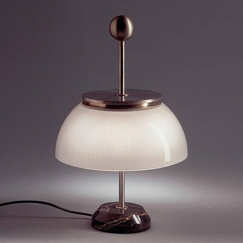 Sergio Mazza 'Alfa' table lamp for Artemide. 

The very first Artemide design, the 'Alfa' used delicate glass, luxurious marble and nickel-plated metal to embody timeless beauty and modern innovation. These authorized editions continue to be made