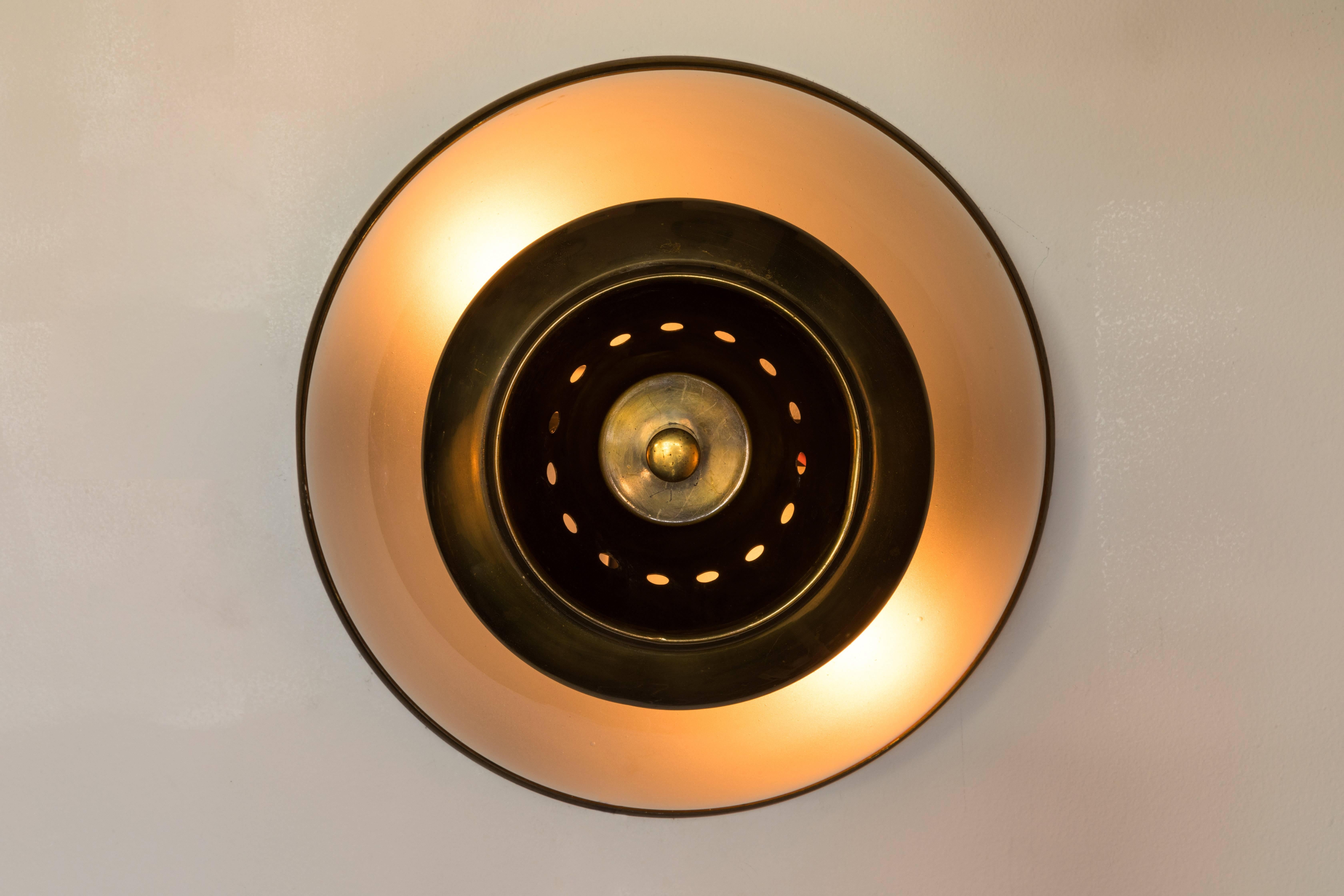 1960s Luigi Caccia Dominioni LSP3 ceiling or wall light for Azucena. Executed in handblown opaline glass and patinated brass. Azucena was one of the most innovative lighting design companies in Italy during the Mid-Century era. Their designs have