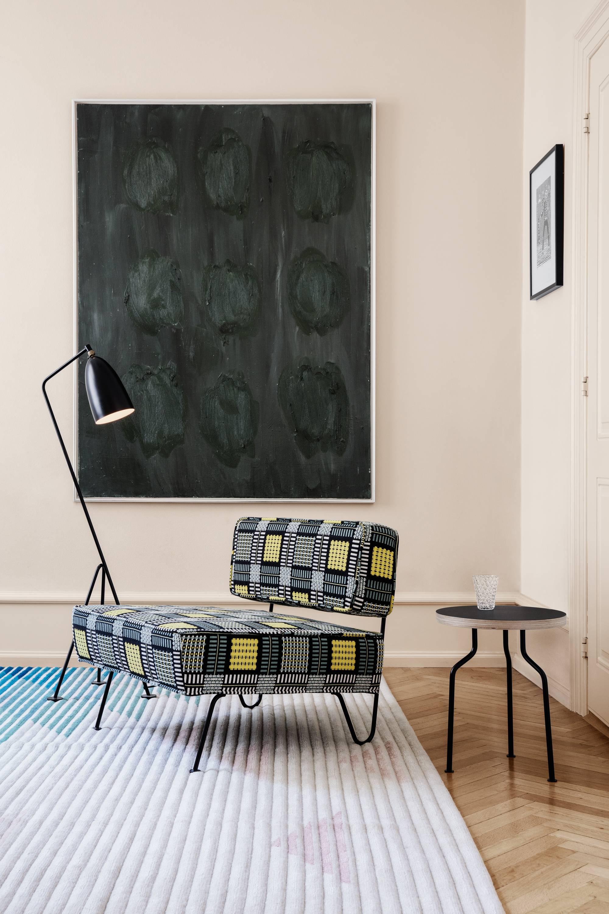 Greta Magnusson Grossman 'Grasshopper' floor lamp in black. Designed in 1947 by Grossman, this is an authorized re-edition by GUBI of Denmark who meticulously reproduces her work with scrupulous attention to detail and materials that are faithful to