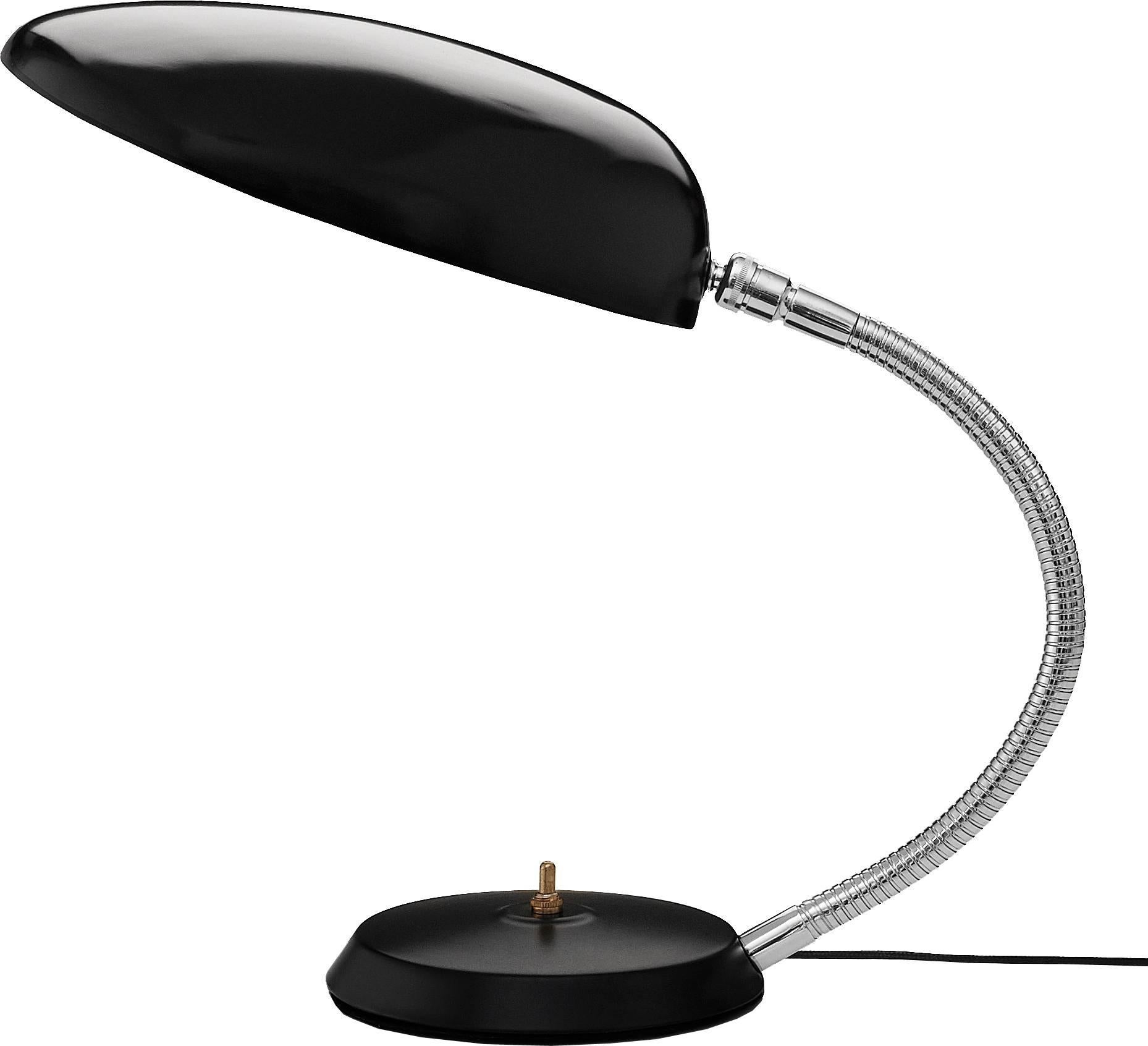 Greta Magnusson Grossman 'Cobra' table lamp in white. Designed in 1950 by Grossman, this is an authorized re-edition by GUBI of Denmark who meticulously reproduces her work with scrupulous attention to detail and materials that are faithful to the