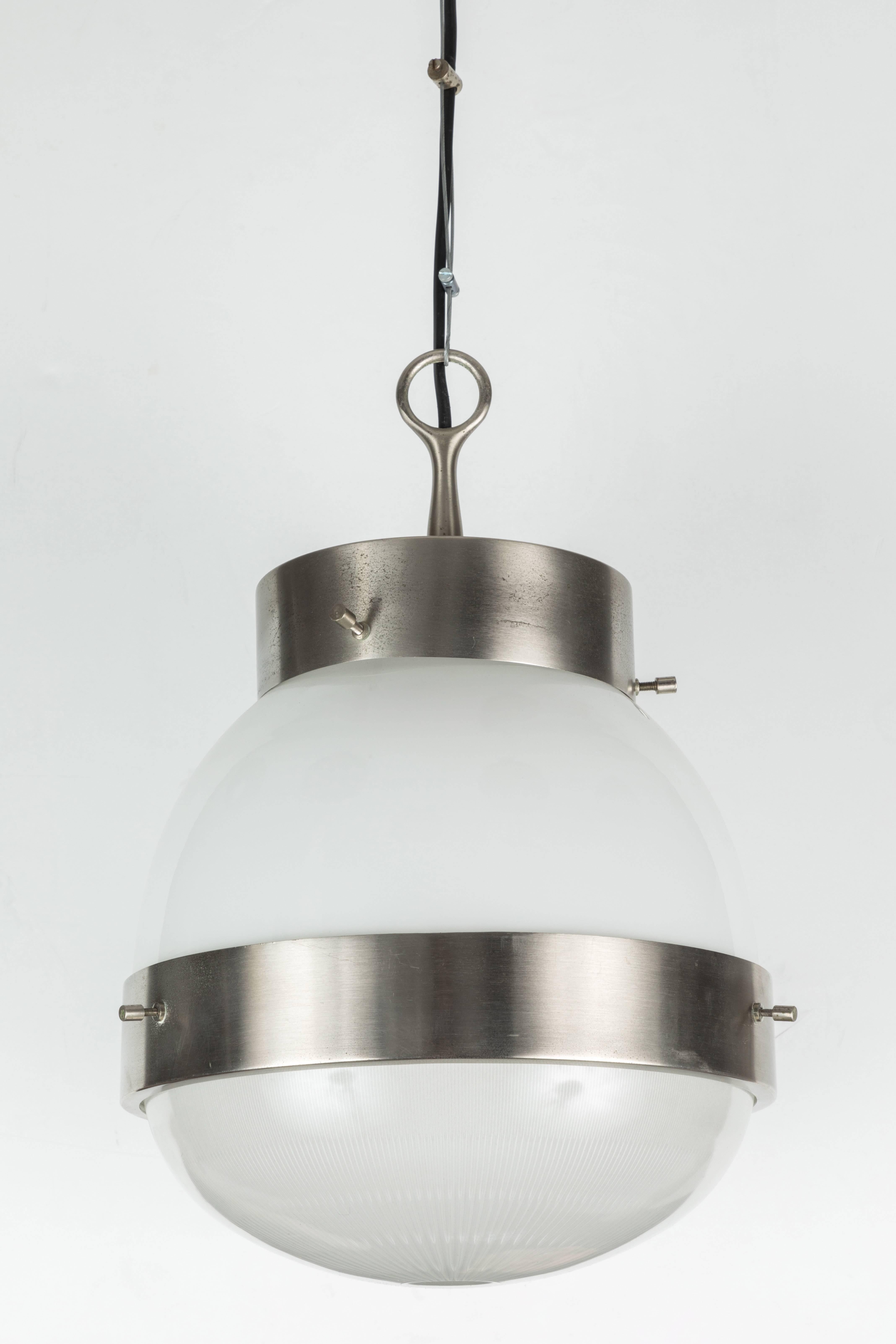 1960s Sergio Mazza 'Delta' pendant for Artemide. An architectural signature design by the incomparable Italian icon of Modernism. Executed in nickelled brass, opaline and pressed glass.

Also available in an all brass option in a separate