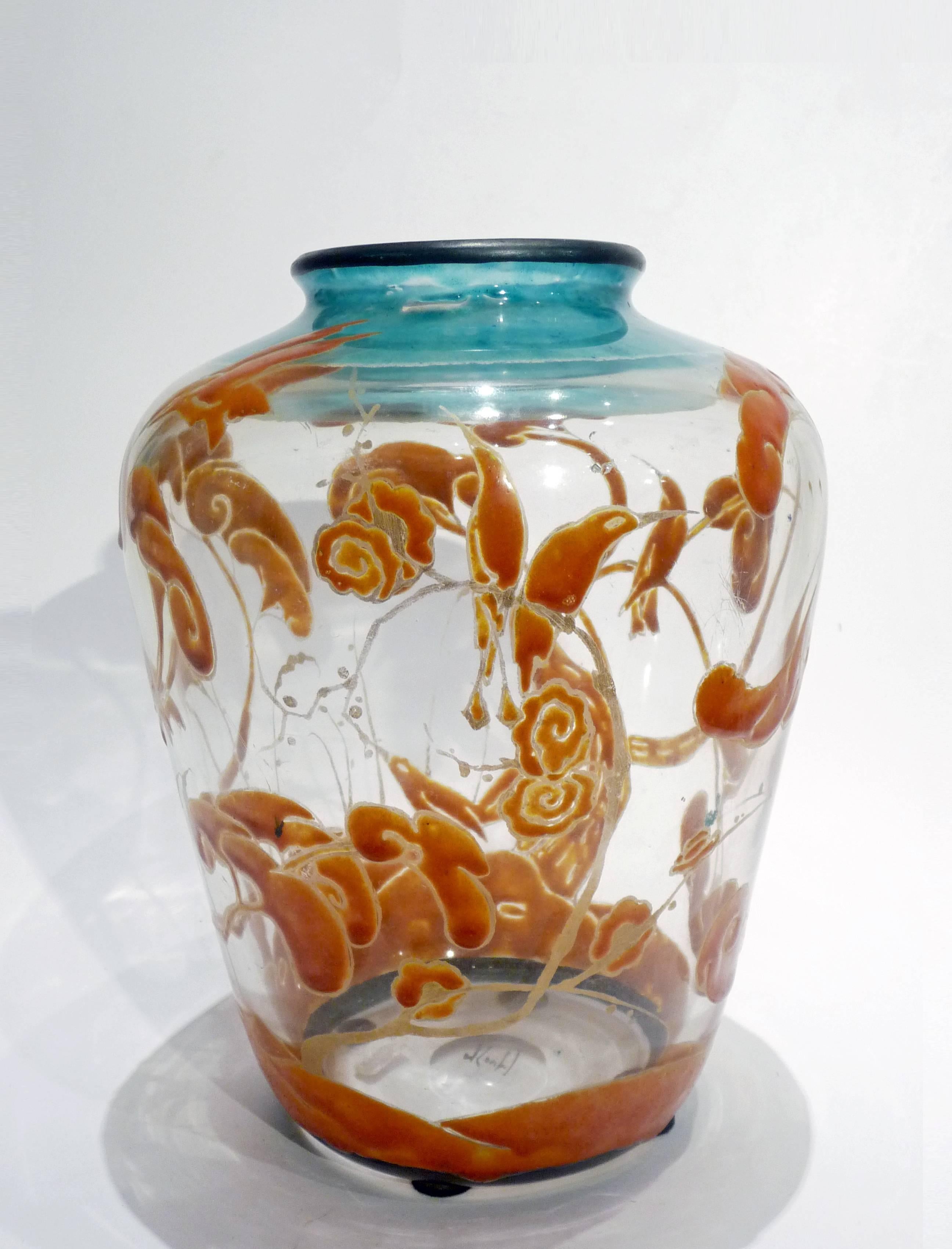 Marcel Goupy 
An Art Nouveau vase in clear glass with an enamel floral polychrome decoration
Signed.
 
