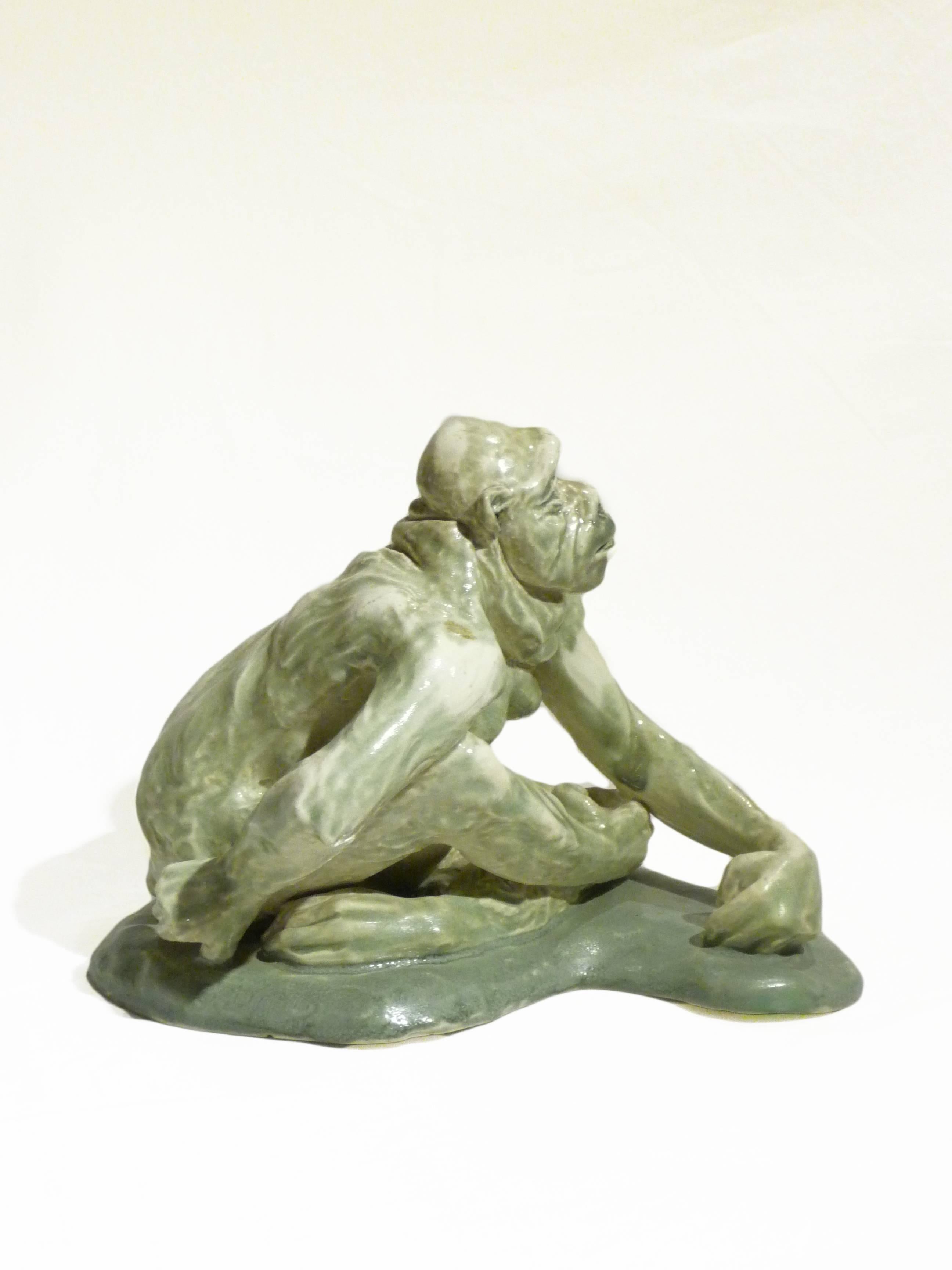 Pierre-Adrien Dalpayrat.
Green and white stoneware sculpture representing a female monkey.
Impressed with the circular seal "Les grands feux de Dalpayrat."

