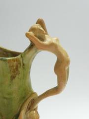 Pierrefonds, a Stoneware Pitcher, Signed