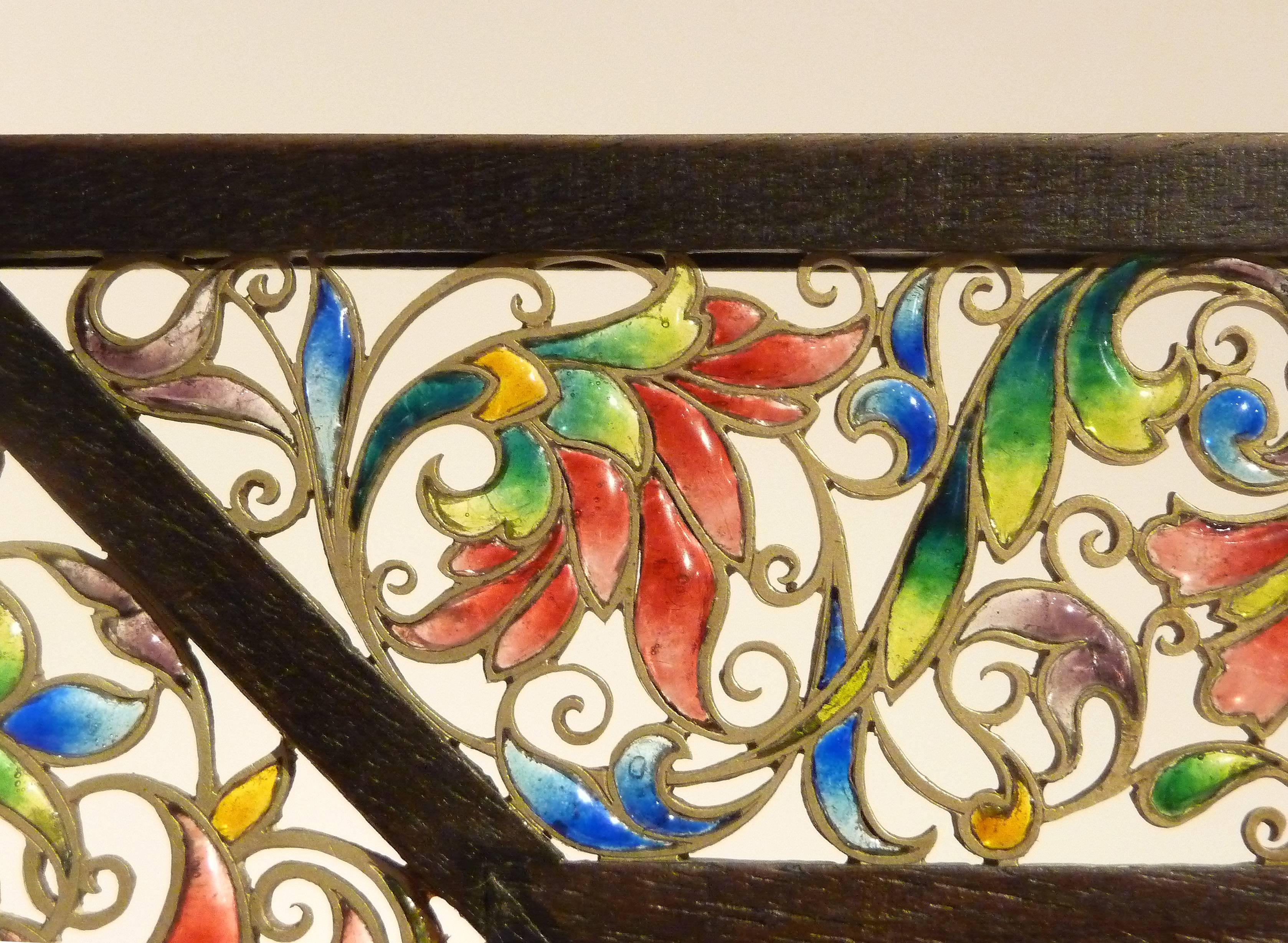 Enguerrand du suau de la croix.
Picture frame.
Polychrome translucent enamels, "plique-à-jour", silver.
Modern wooden frame.
