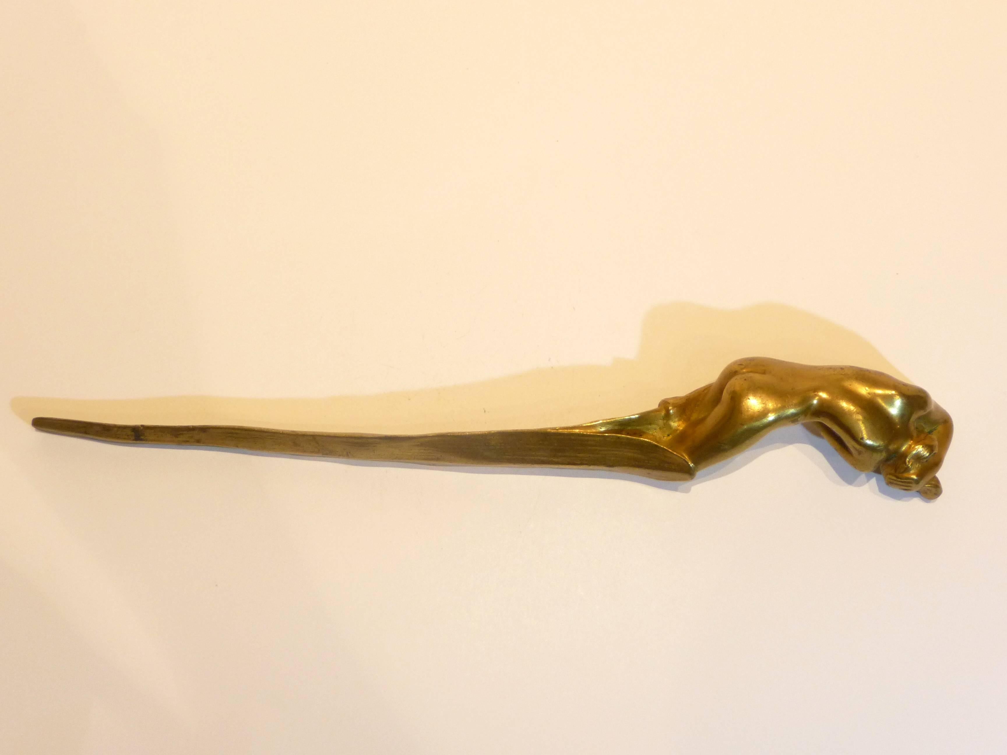 Léo Laporte-Blairsy
An Art Nouveau gilt bronze letter opener featuring a nymph hiding her face, the blade shaped as stylized foliage.
Signed.
Exhibition:
Salon des Artistes Français, Paris, 1902, Section des Arts Décoratifs.