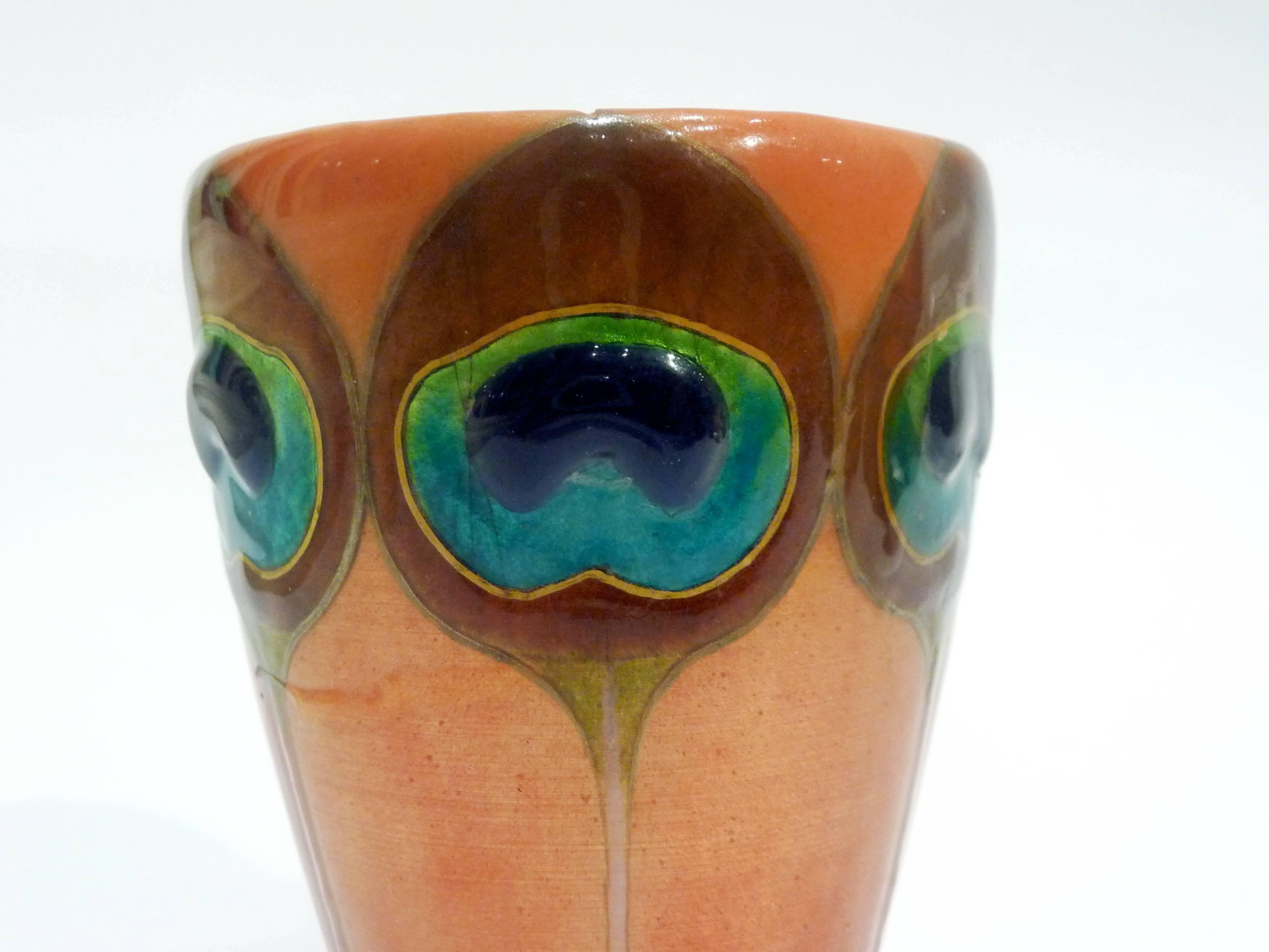 Georges Jean
Polychrome enamel vase on copper decorated with peacock feathers
Signed 