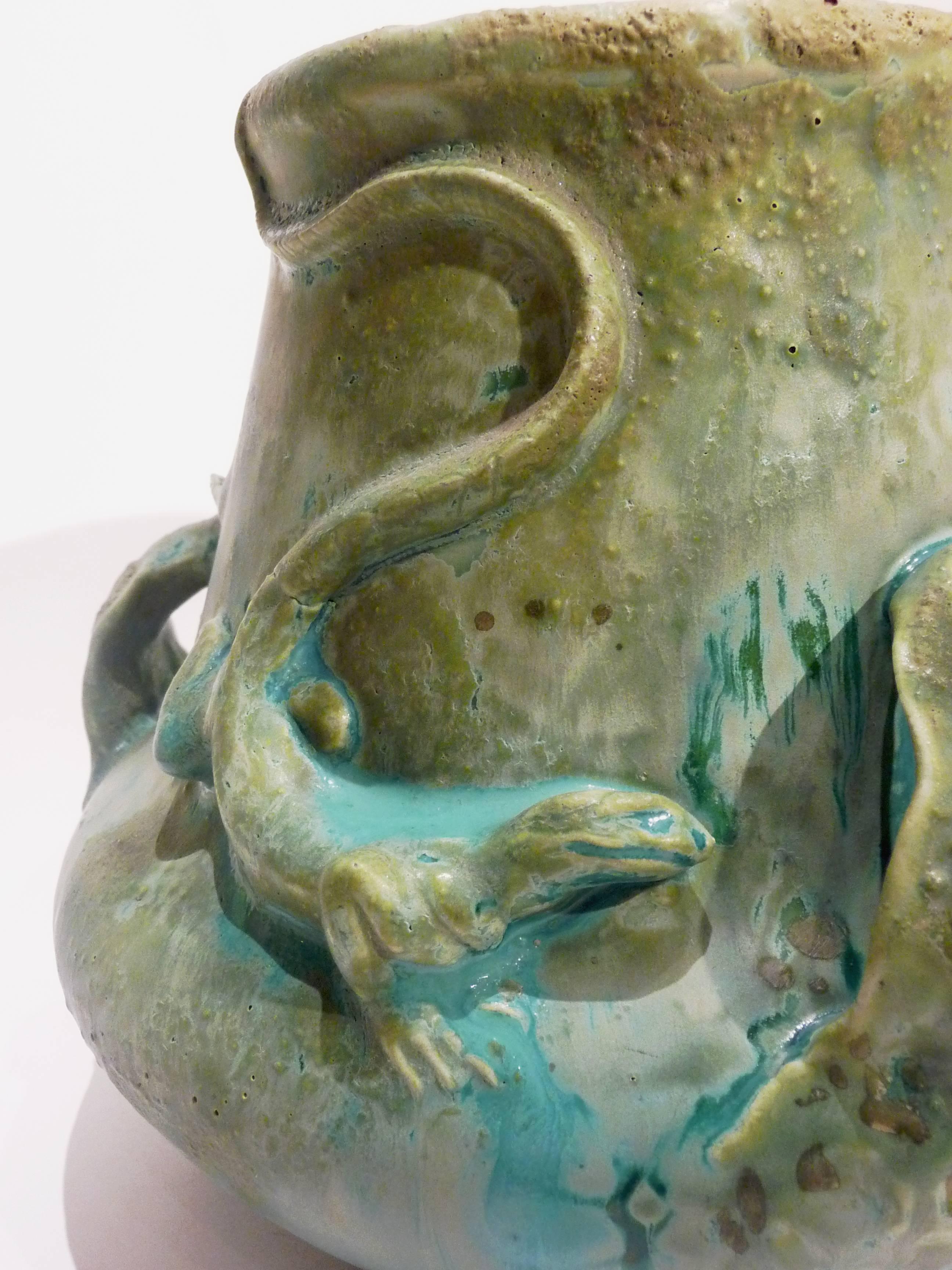 Charles Virion
An art nouveau vase
Grès with a celadon green glaze. Decor of three salamanders and three openwork handles
Signed 