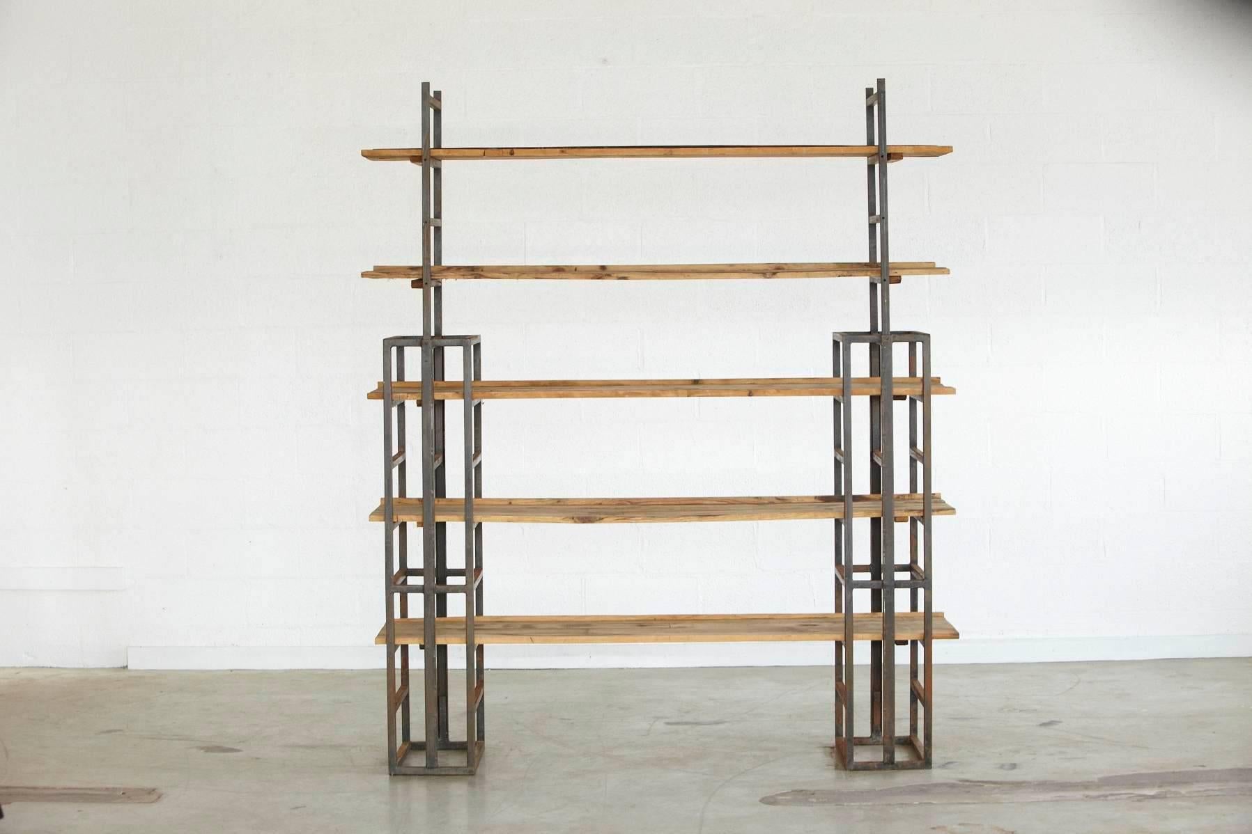 Custom-made Industrial style steel and five-tiered wood plank etagere.
Welded steel construction, height adjustable. Great patina. Sturdy construction.
Dimensions: collapsed H 53.75, fully extended 72