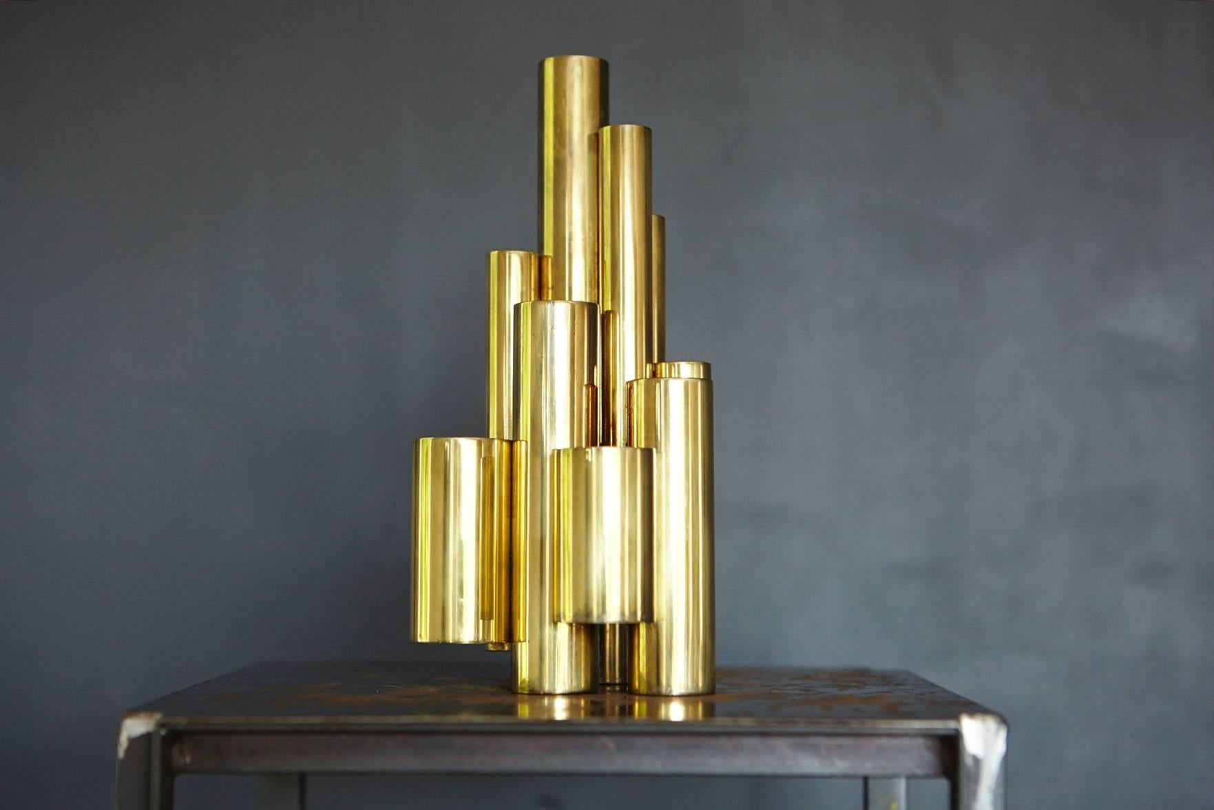 Beautiful patinated sculptural tubular brass candleholder in the style of Gio Ponti for 5 candles. Stamp in the brass saying Made in Israel - Bier.