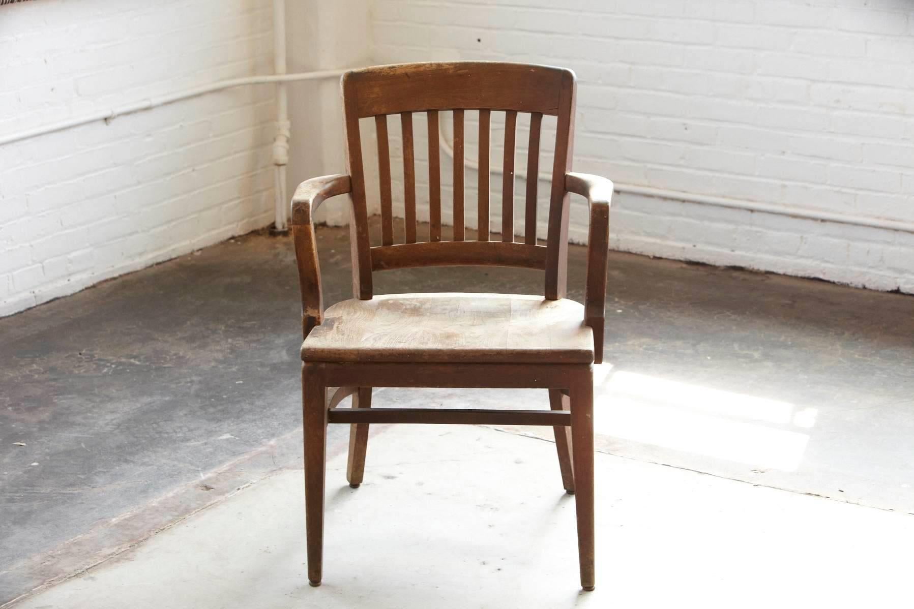 "Chairs for your working comfort", advertising slogan by Gunlocke for this solid and sturdy 1920s oak office armchair made by W.H. Gunlocke chair company in Wayland, New York. Original sticker on the bottom, great patina.
Please see our