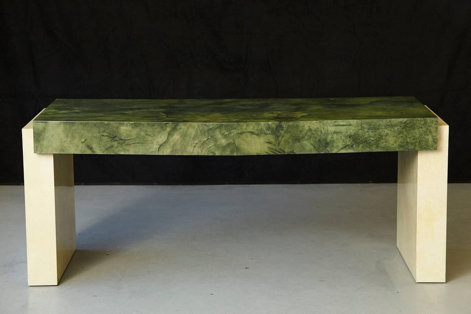 Exceptional large custom ordered desk by Karl Springer with a marbleized emerald green lacquered goatskin top and marbleized ivory lacquered base.
Three drawers, the middle one has a removable pencil canoe.
Exceptional detailed work and shades in