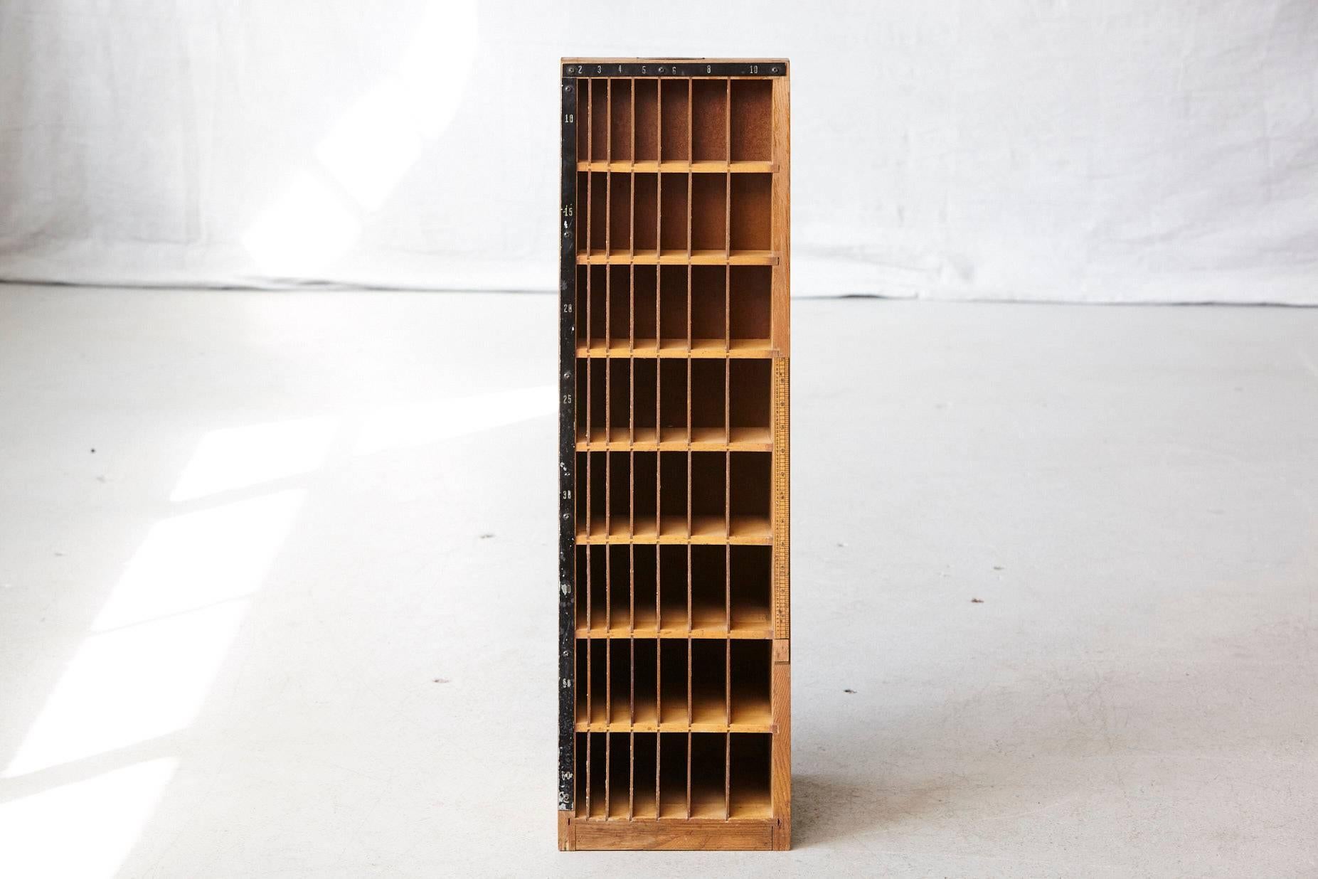 Unusual wooden furniture which has been used for the the storage of differently sized wood blocks. These wood blocks have been used for the letterpress as distance holders for headlines and articles.
Manufactured by Thompson Cabinet Company,