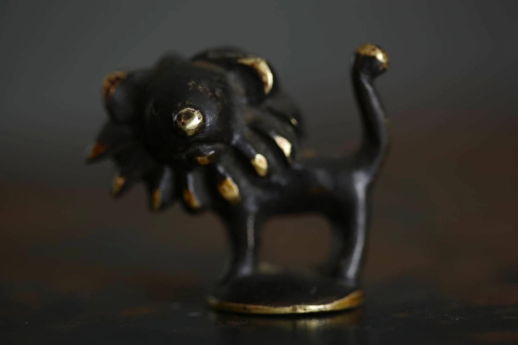 A very charming little brass lion figurine. Another one of Walter Bosses' humorous animal designs in brass.
Manufactured by Hertha Baller in Austria in the 1950s. The figurine is in excellent condition.
In the 1950s Bosse developed an innovative