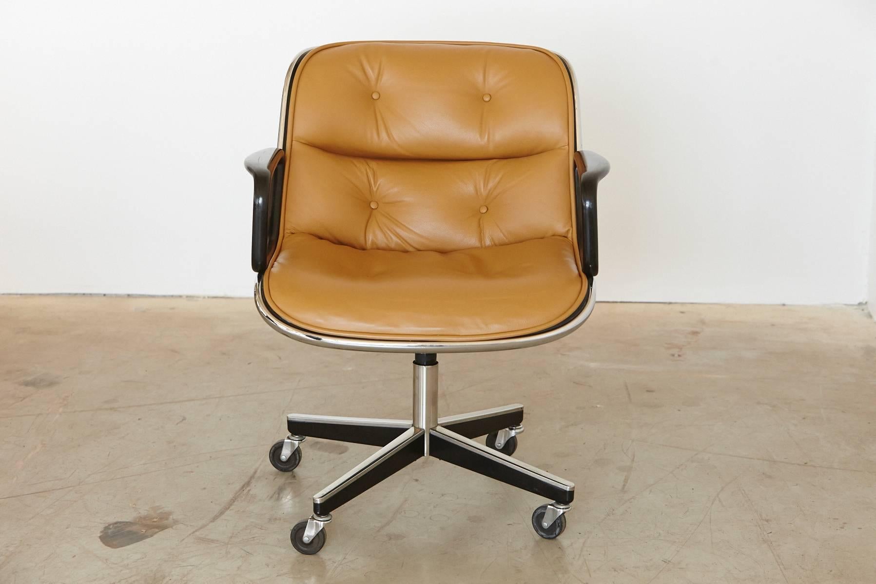 Fantastic executive chair designed by Charles Pollock for Knoll International. 
The chair is in excellent condition, the single aluminum band and outer shell are impeccable, recently upholstered in tan Edelman leather. 
The four-star chrome / black