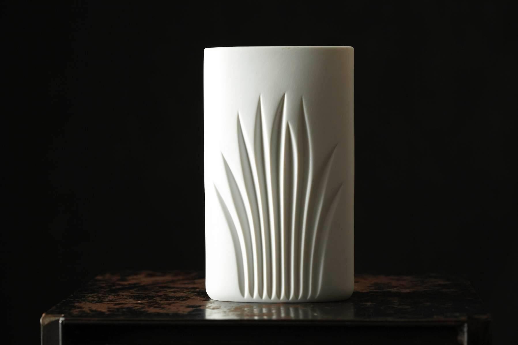 Beautiful white matte oval porcelain vase with Minimalist foliage designed by Claus Josef Riedel for Rosenthal Studio Line.
Special edition for the 100th anniversary year of Rosenthal, 1979.
Marked on the base-100 Jahre Rosenthal, Rosenthal studio