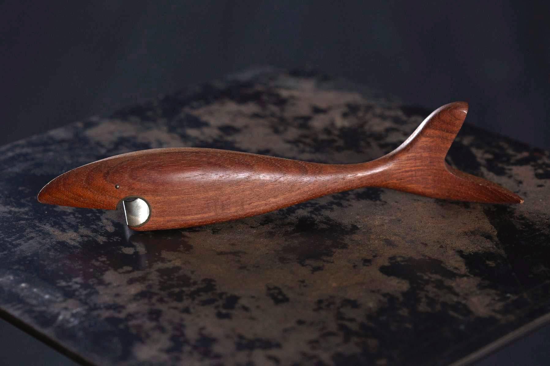 Cute bottle opener in form of a teak shark or fish, made in Denmark, circa 1960s.