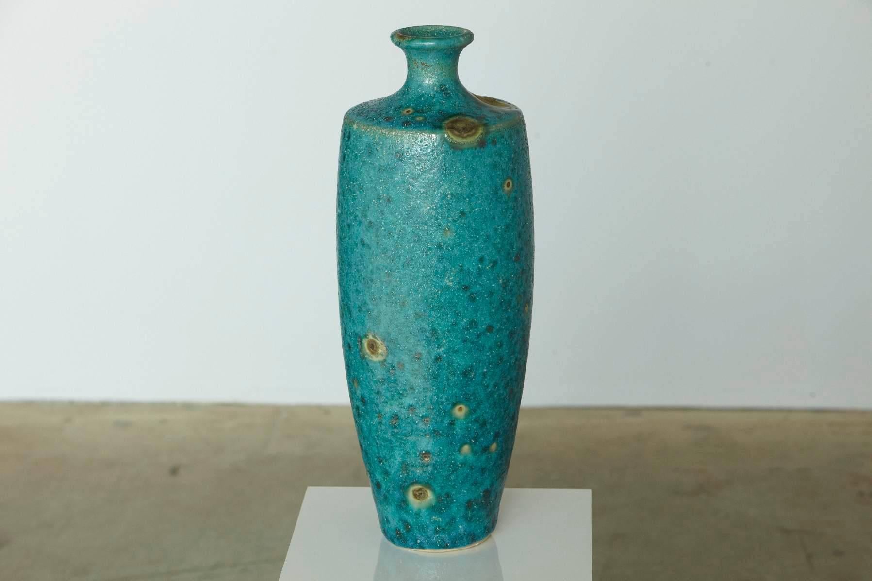 Beautiful large Italian modern ceramic fat lava glaze vase in turquoise blue with golden sunbursts in the style of Guido Gambone.
Very good, almost excellent condition, no chips, flea bites, cracks or repairs.