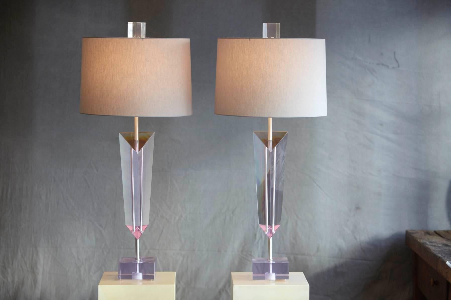 Impressive pair of large light purple Lucite table lamps with brushed steel stem and 
brand new grey linen shades with rolled edge.
Designed by Van Teal, signature etched into Lucite base.
One finial as a small mark to the corner. No chipping,
