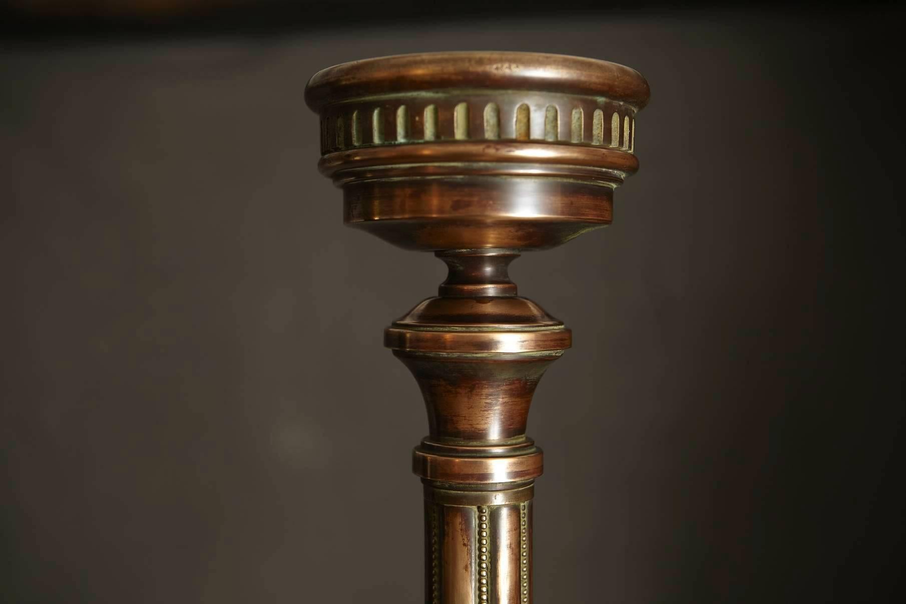 Early 20th century tall brass candleholder with great patina.
Solid and sturdy candlestick.