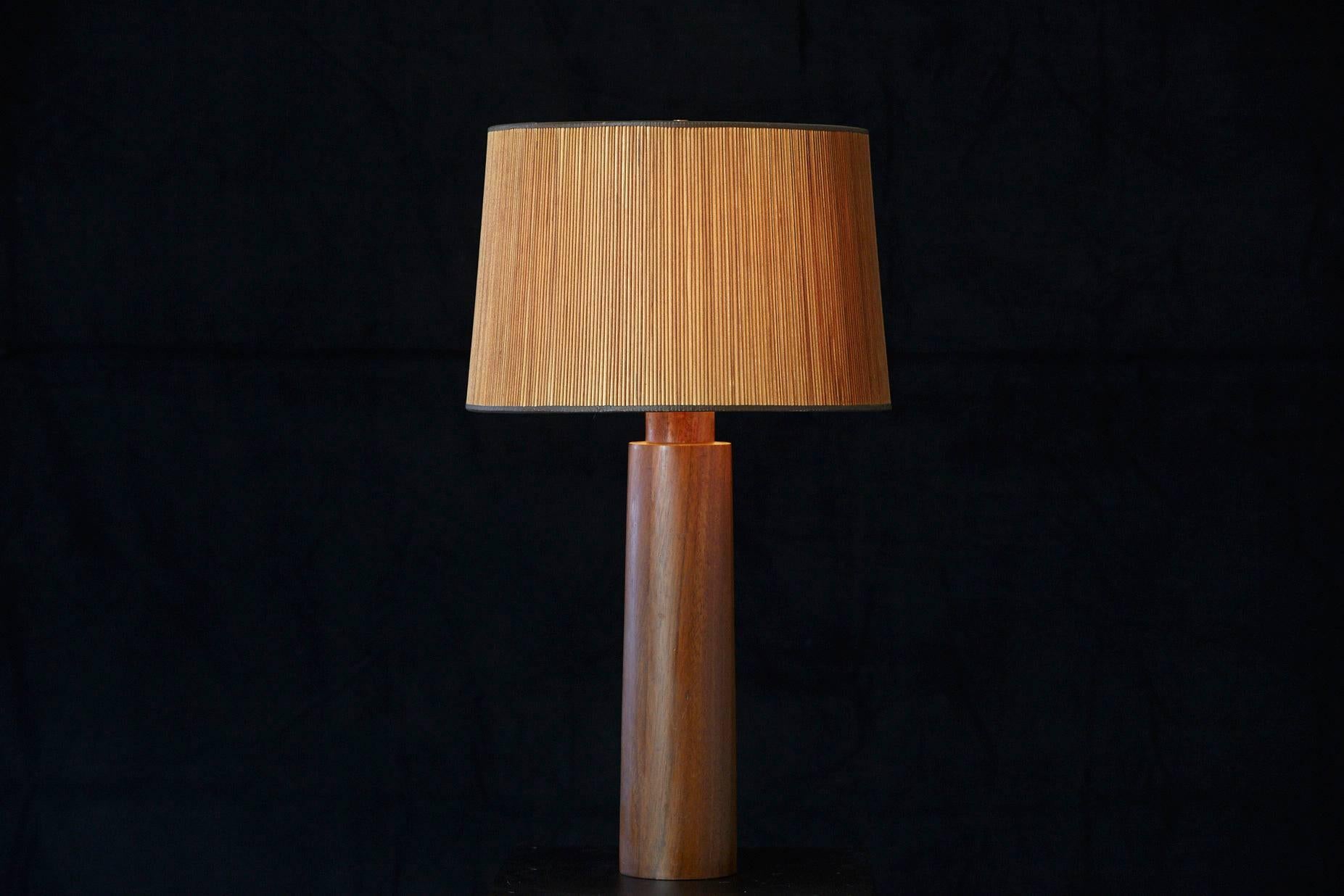 Large solid teak lamp with Japanese inspired lampshade made with thin wood rots. A few minor dents in the neck, nice patina. 
Height to finial 32.5
