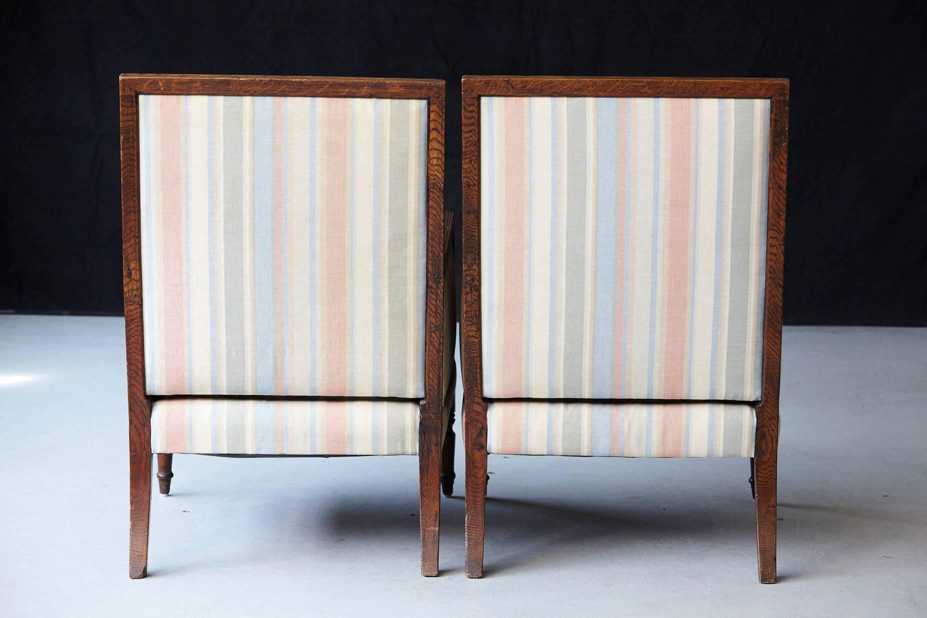 Walnut Pair of Italian Neoclassical Style Bergères in Pastel Striped Moiré Taffeta