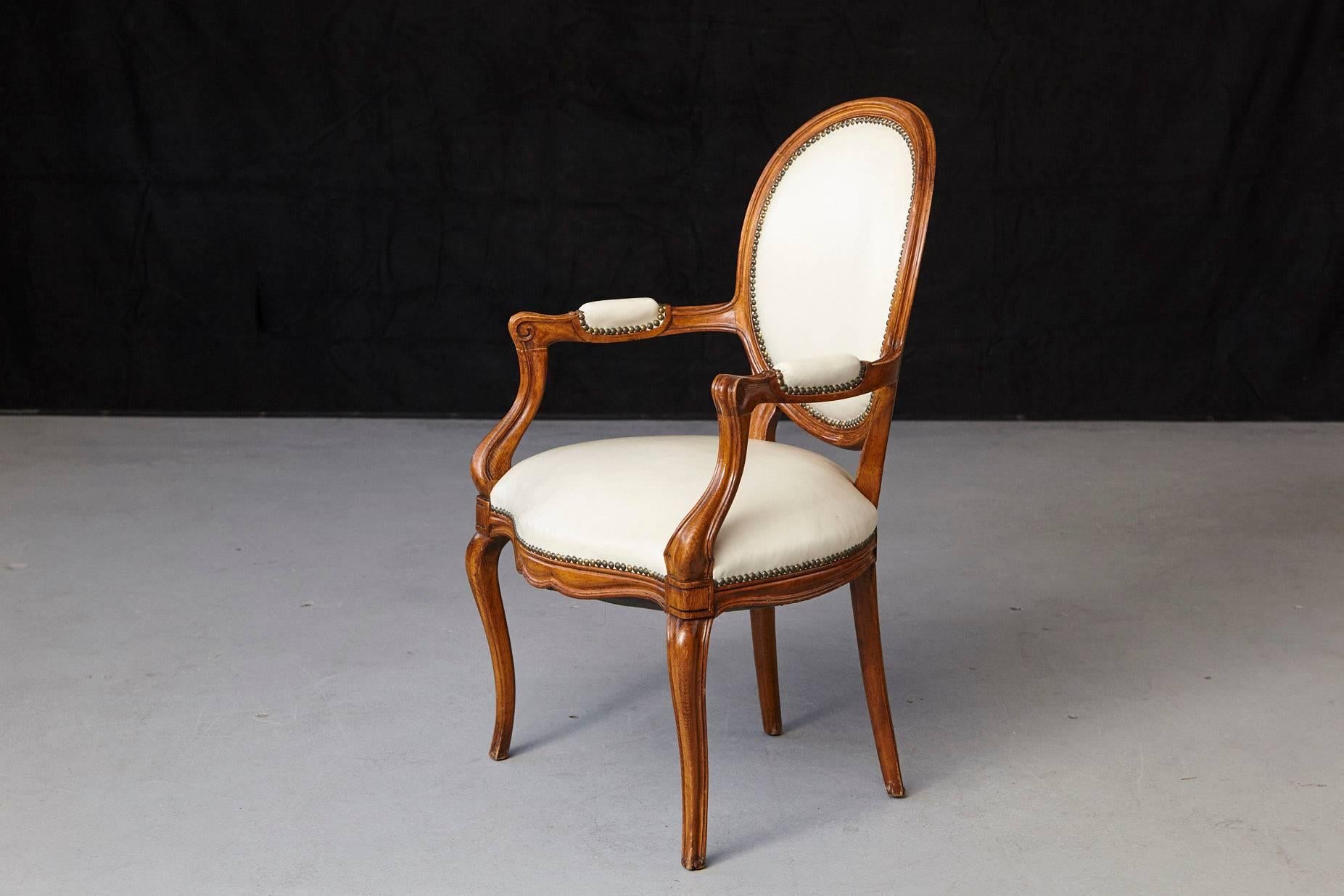 French Louis XV Style Walnut Fauteuil in Nail Trimmed Creme Leather