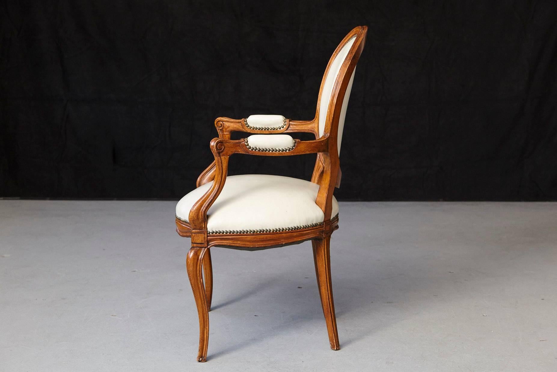 Late 19th Century Louis XV Style Walnut Fauteuil in Nail Trimmed Creme Leather