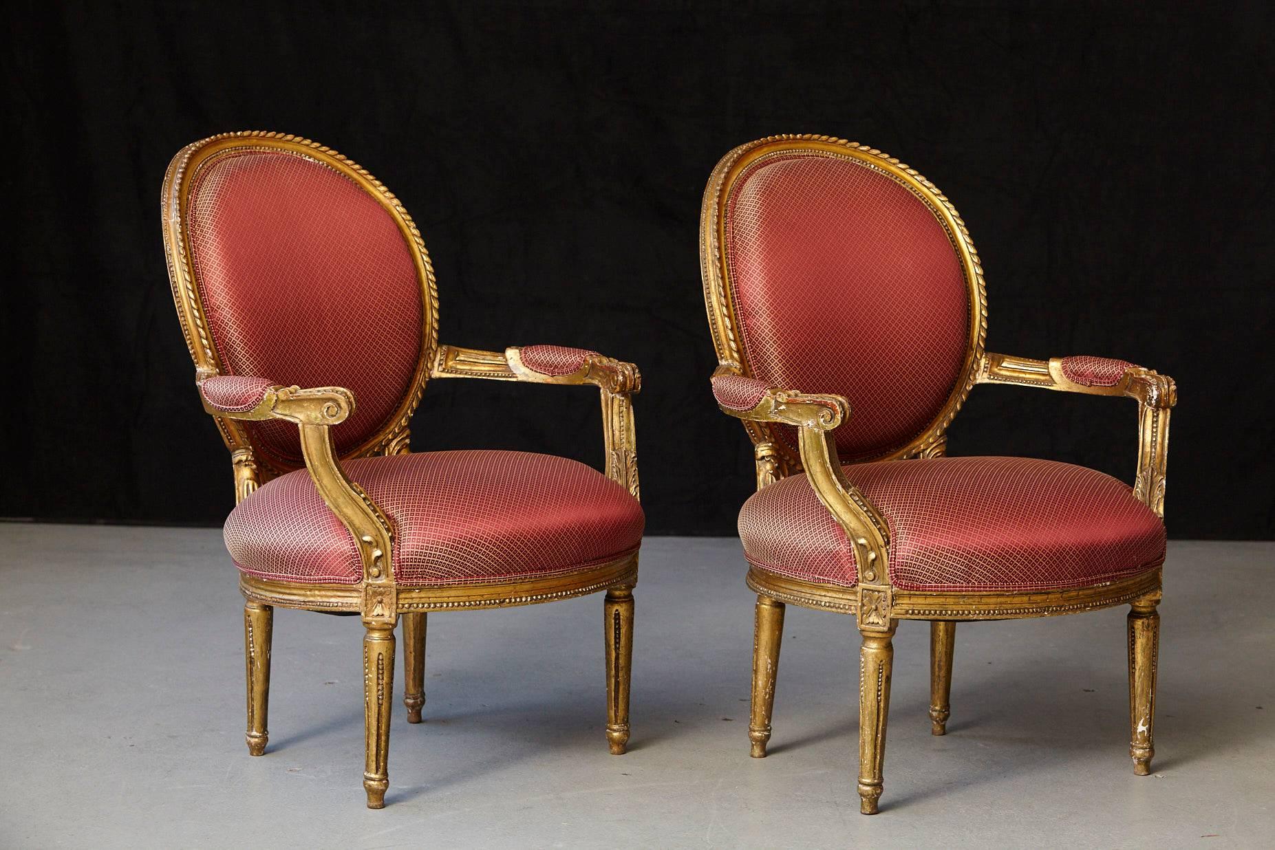 Gilt Pair of French Louis XVI Style Gilded Fauteuils