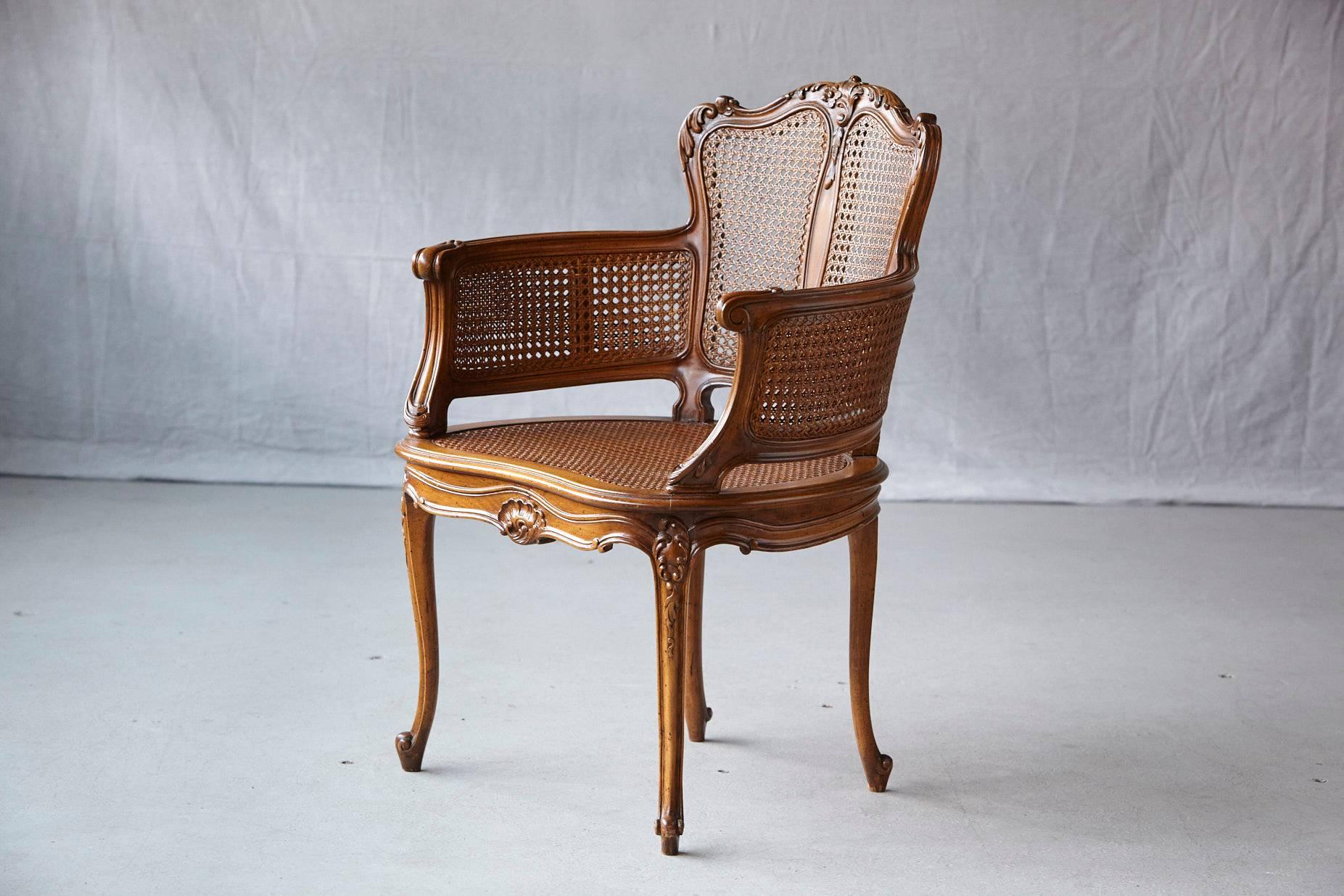 French Early 20th Century Rococo Style Caned Armchair with Elaborated Carvings