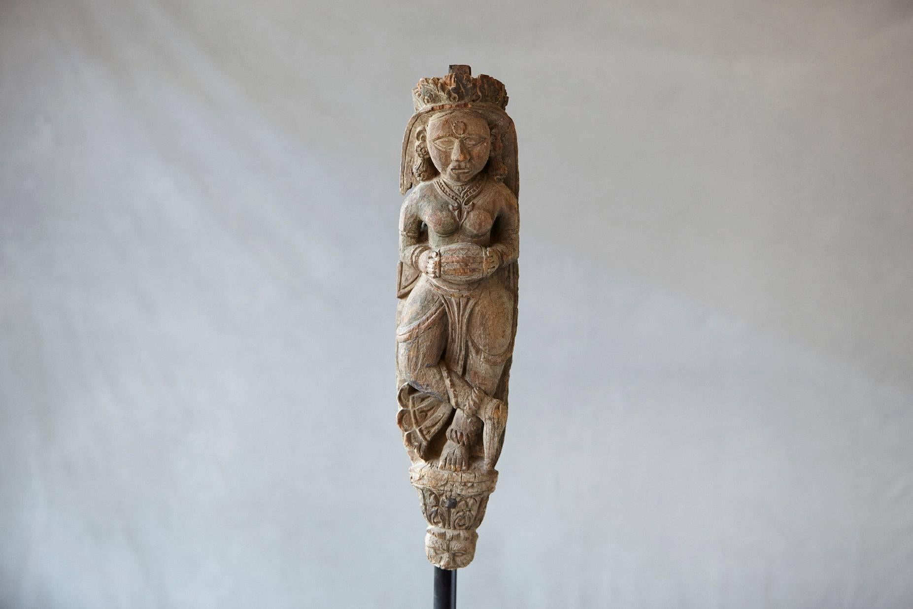 Hand-carved wood wall sculpture of an Indian goddess with very nice patina. Purchased in India, circa 1960s.