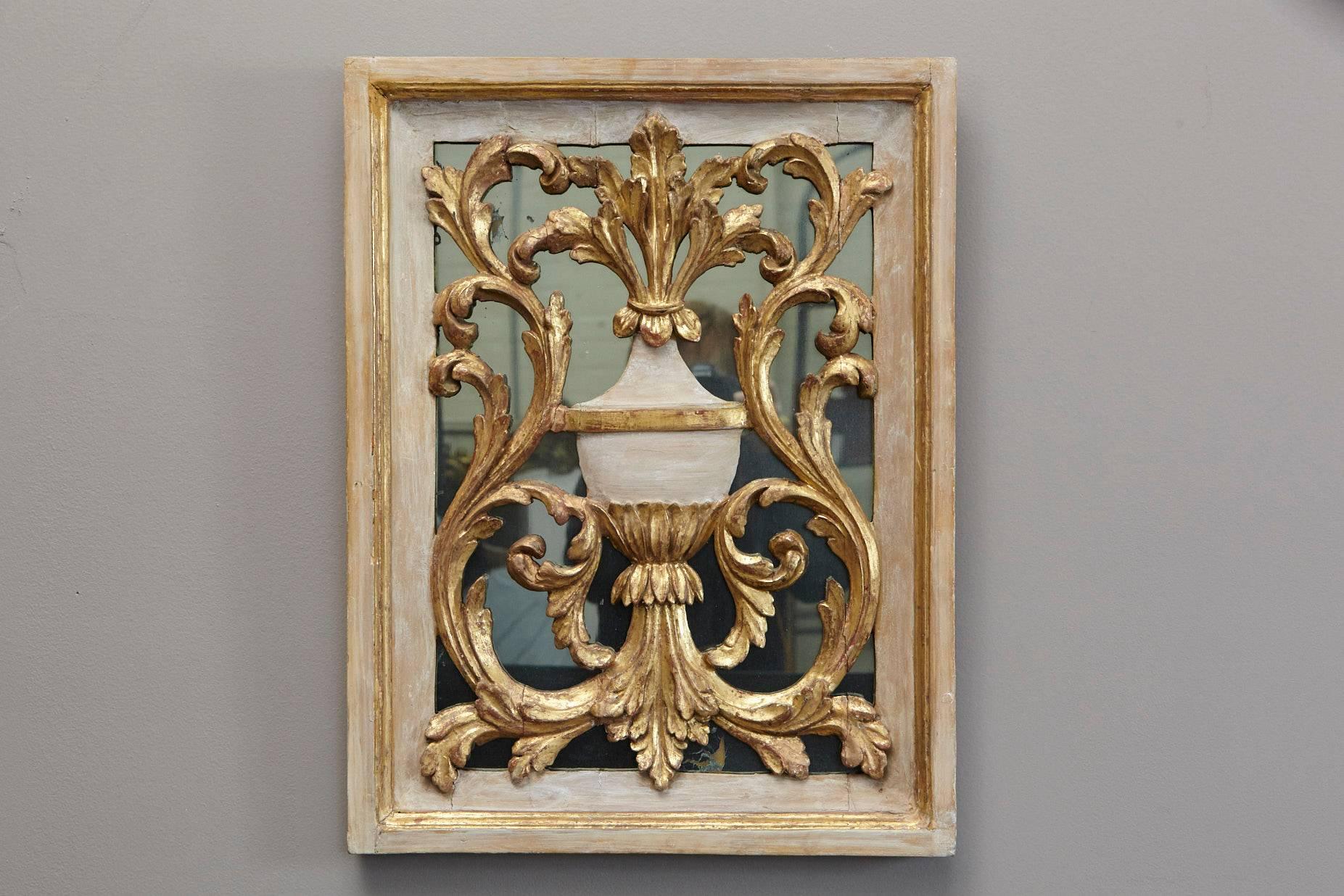 Gorgeous 19th century Venetian style painted and gilded carved wood mirror back panel.
Some restorations have been done to the gesso, beautiful patina. Original mirror glass.