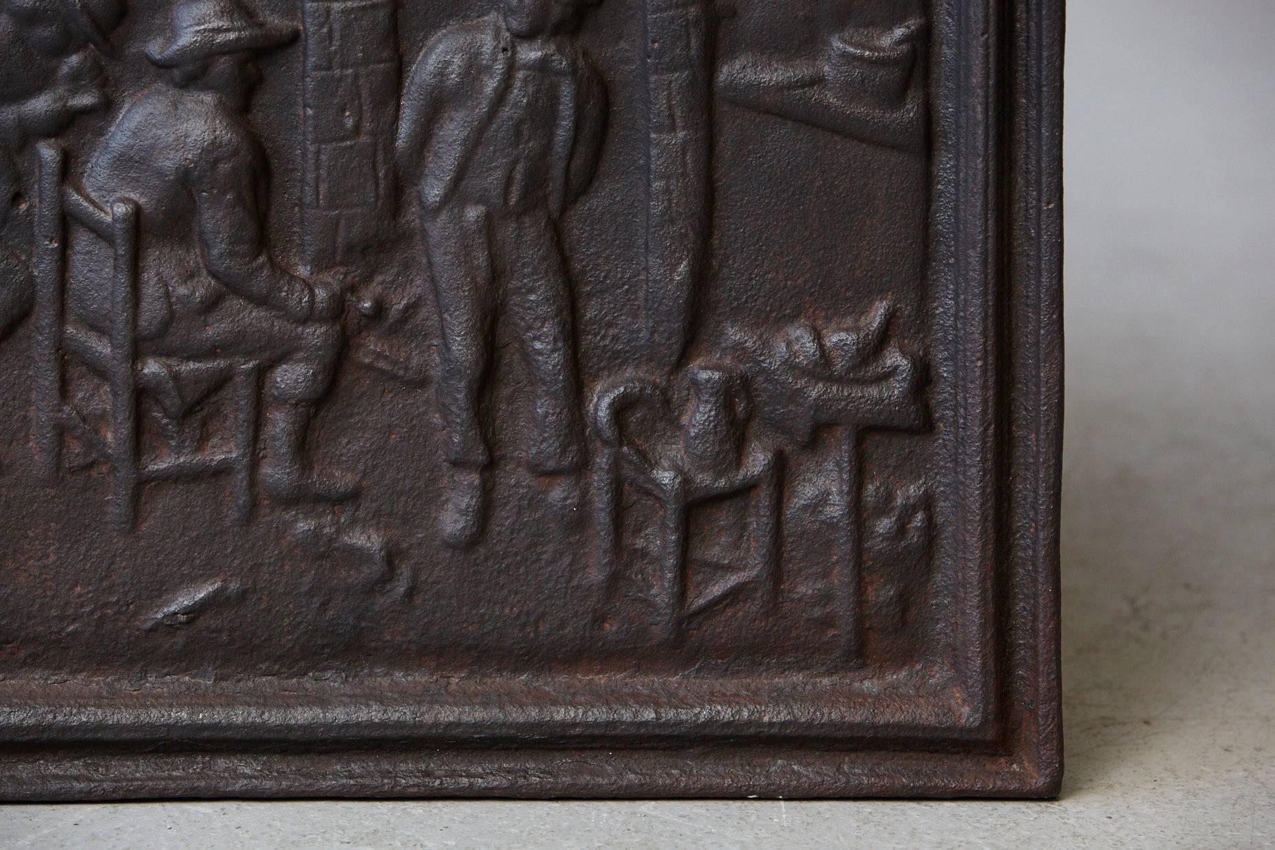 19th Century Black Iron Fireback Depicting a Scene in a Home In Excellent Condition In Pau, FR